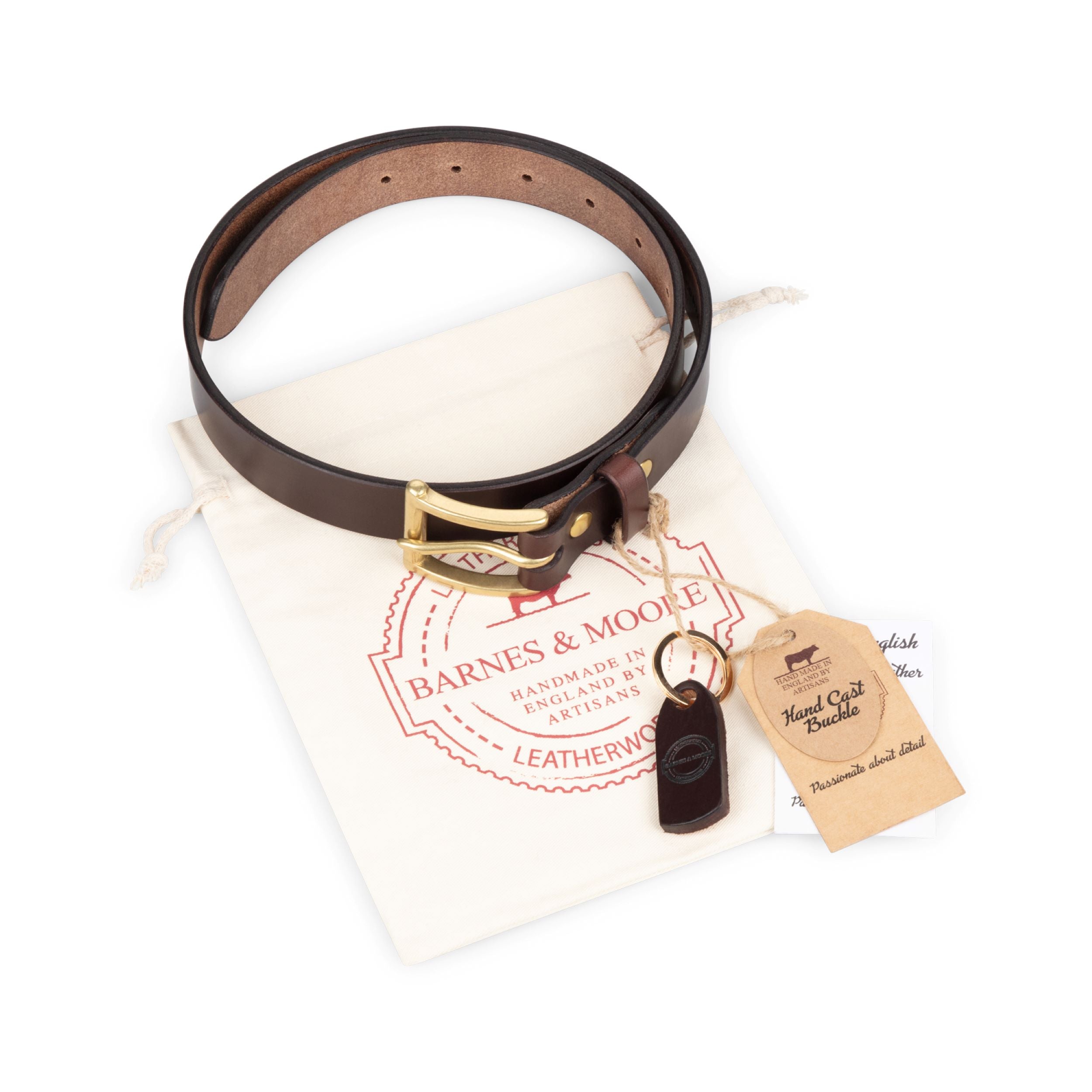 STURDY BROWN LEATHER BELT WITH GOLD BUCKLE AND COTTON DRAWSTRING PRINTED BARNES & MOORE BAG AND KEYRING