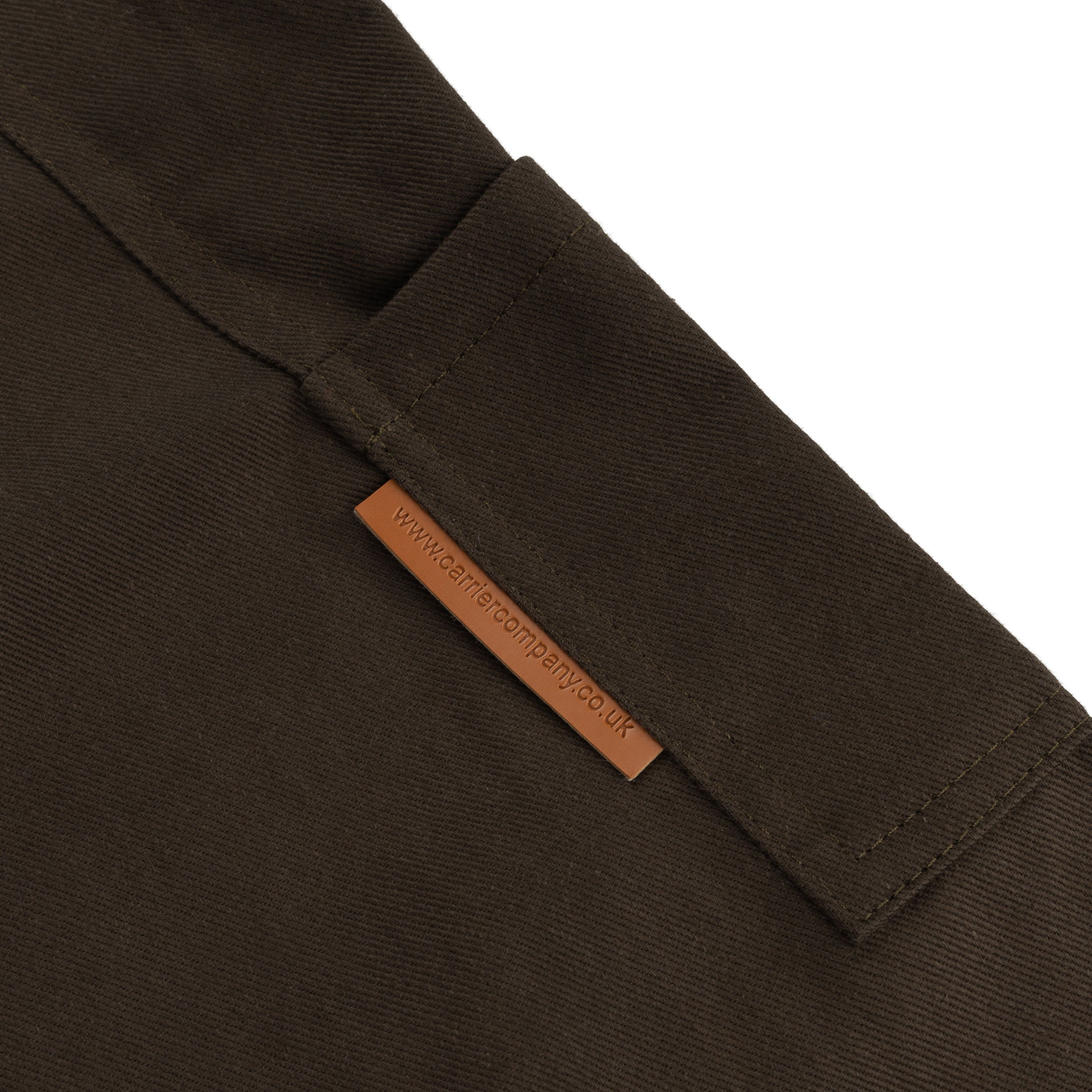 Close up of the pocket detail on the Carrier Company Men's Dungarees in Olive