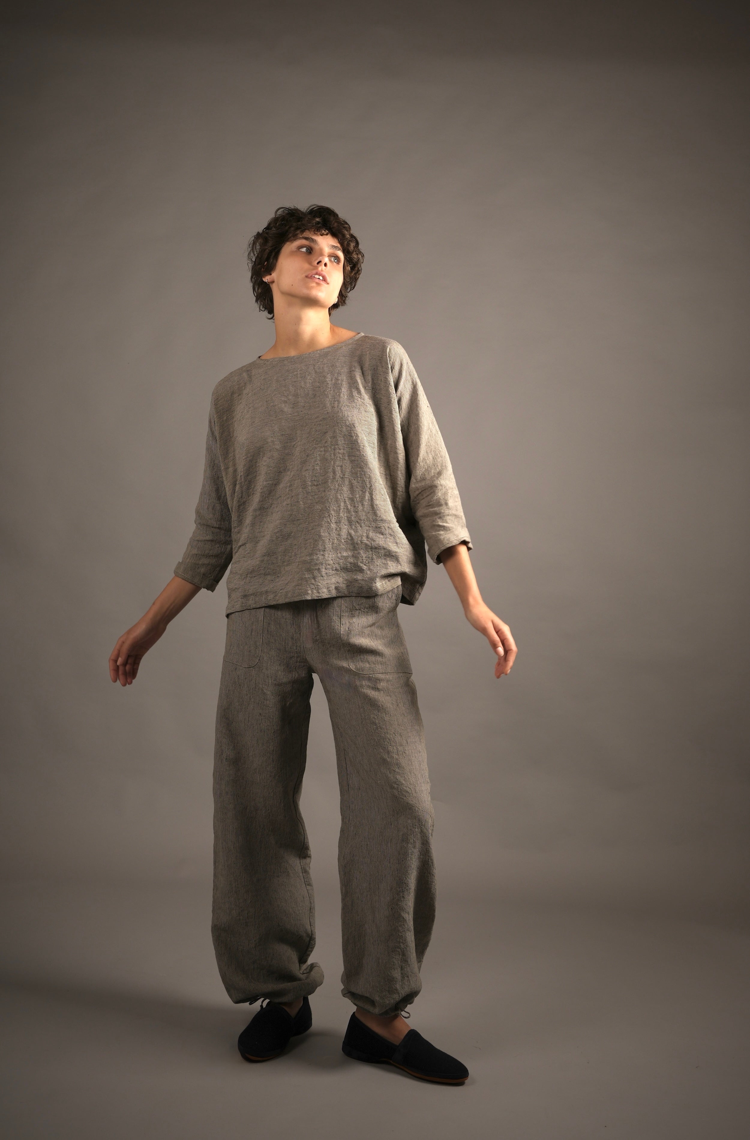 Els wears Carrier Company Linen Jogger In Charcoal Needle Stripe Linen and matching Linen Top
