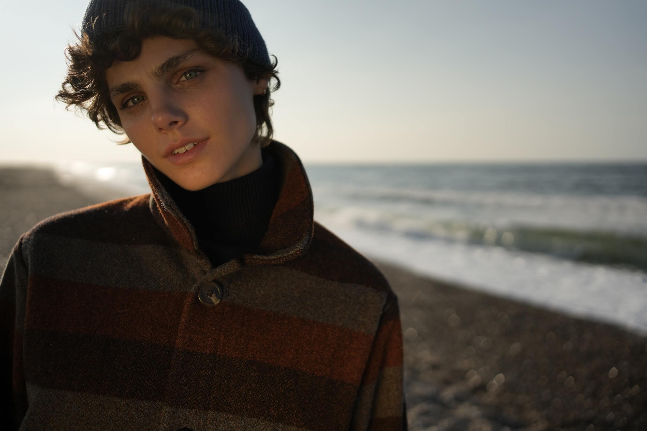 Els Wears Carrier Company Wool jacket in Conker Stripe With Superfino Merino Jumper, Dutch Trouser in Corduroy & Merino Watch Cap