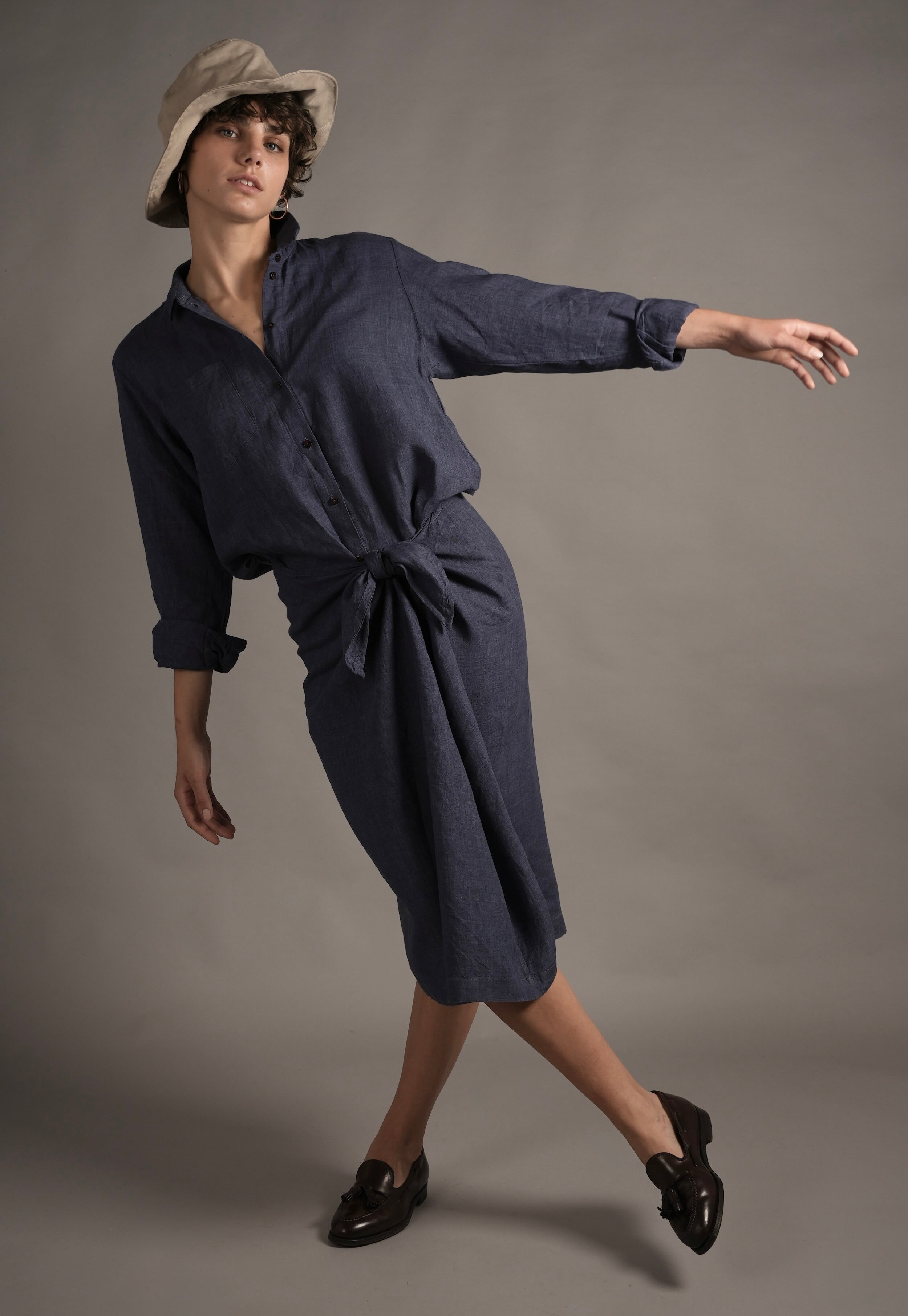 Els wears Carrier Company Shirt Wrap Dress in Navy Linen & Cotton Sun Hat