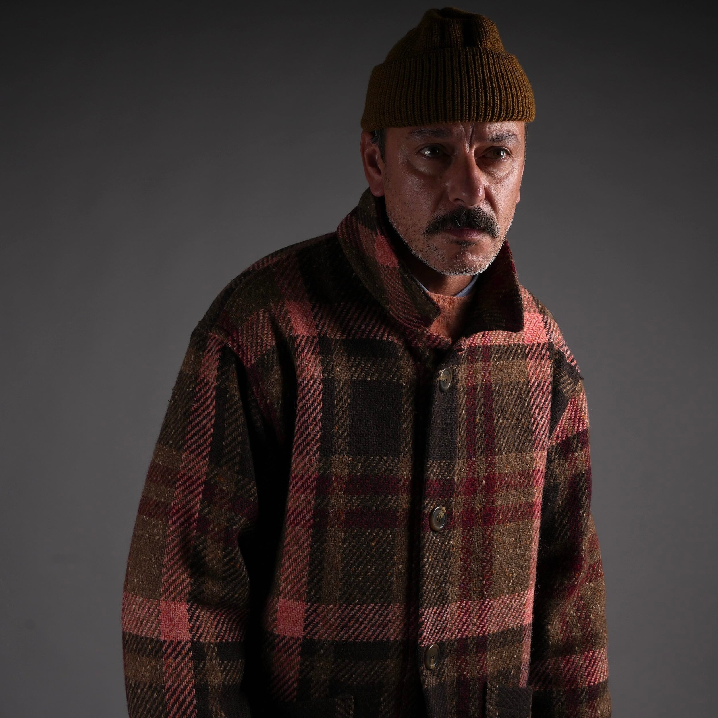 Enzo wears Wears Carrier Company Celtic Wool Jacket in Rose