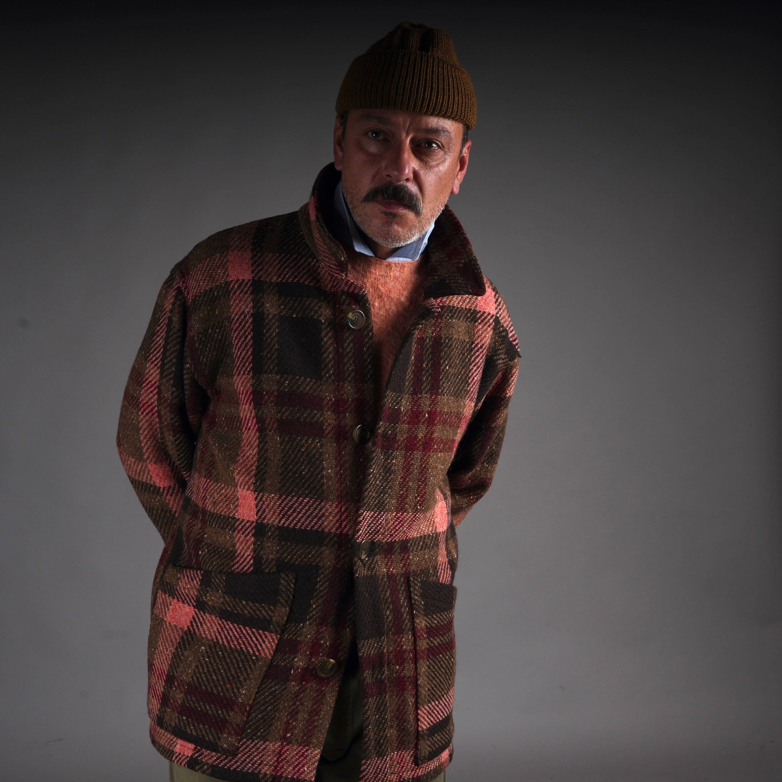 Enzo wears Wears Carrier Company Celtic Wool Jacket in Rose