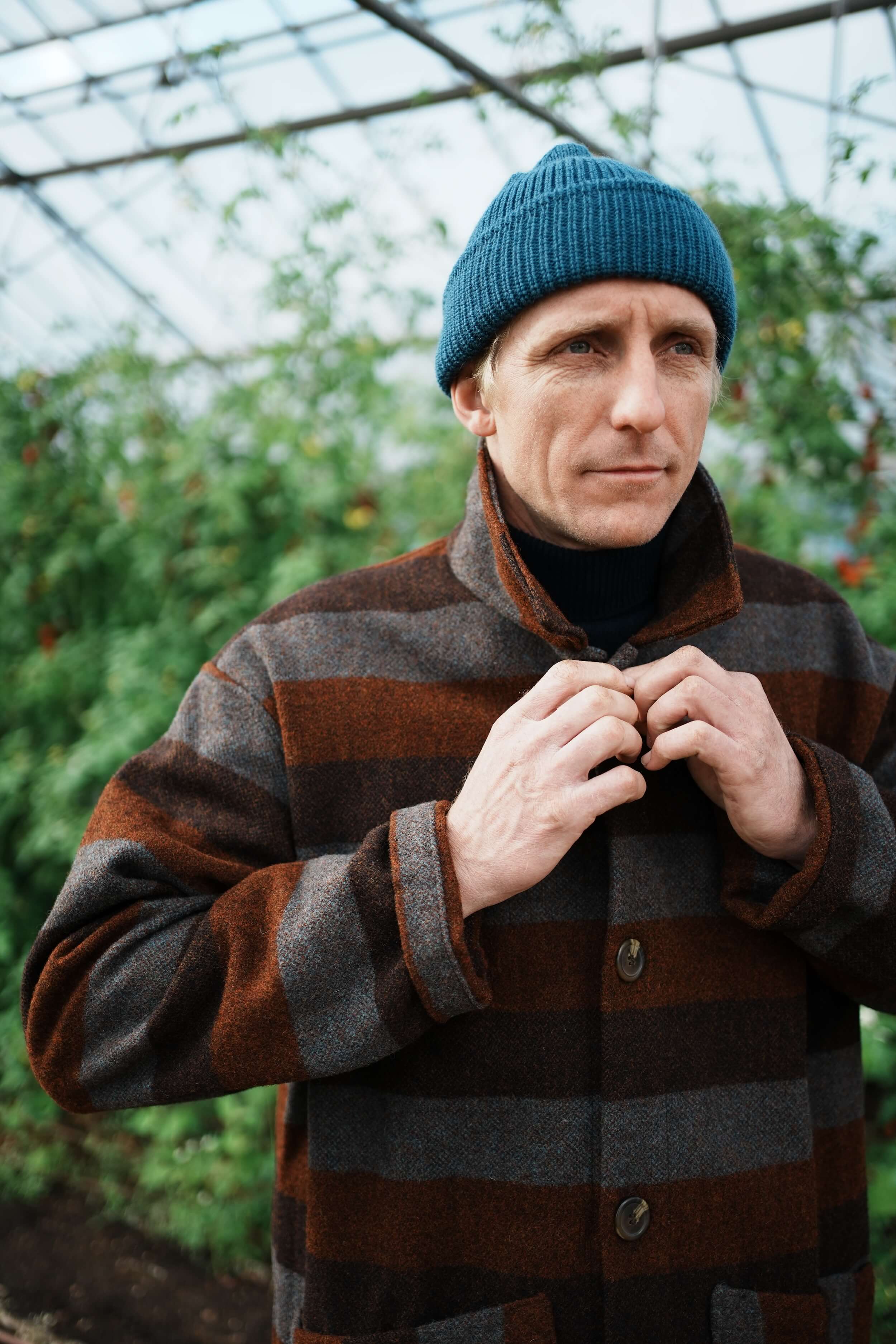 Tommy Wears Carrier Company Yorkshire Wool Jacket In Conker Stripe WIth Merino Wool Jumper, Wool Watch Cap & Men's Work Trouser in Tan