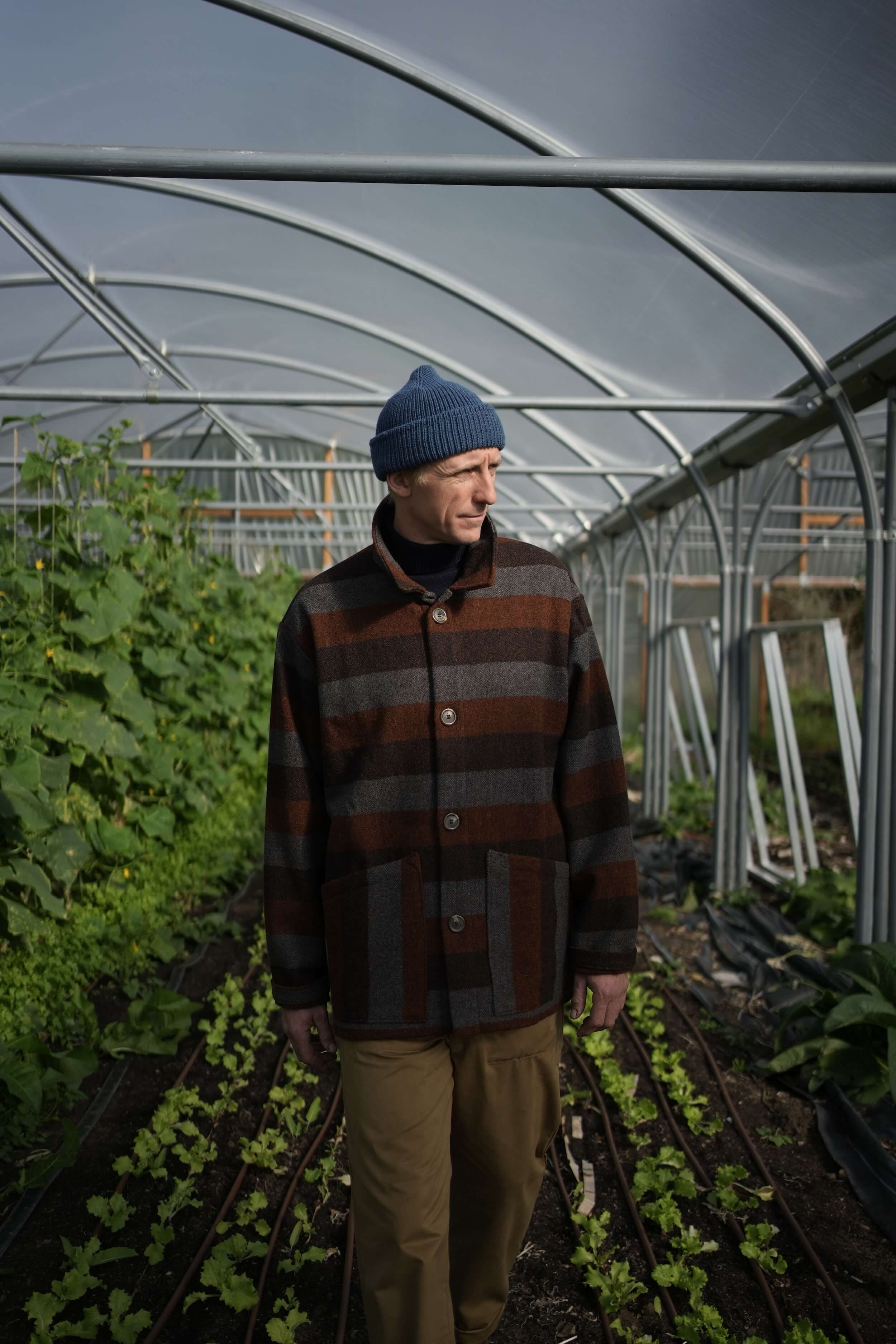 Tommy Wears Carrier Company Yorkshire Wool Jacket In Conker Stripe WIth Merino Wool Jumper, Wool Watch Cap & Men's Work Trouser in Tan