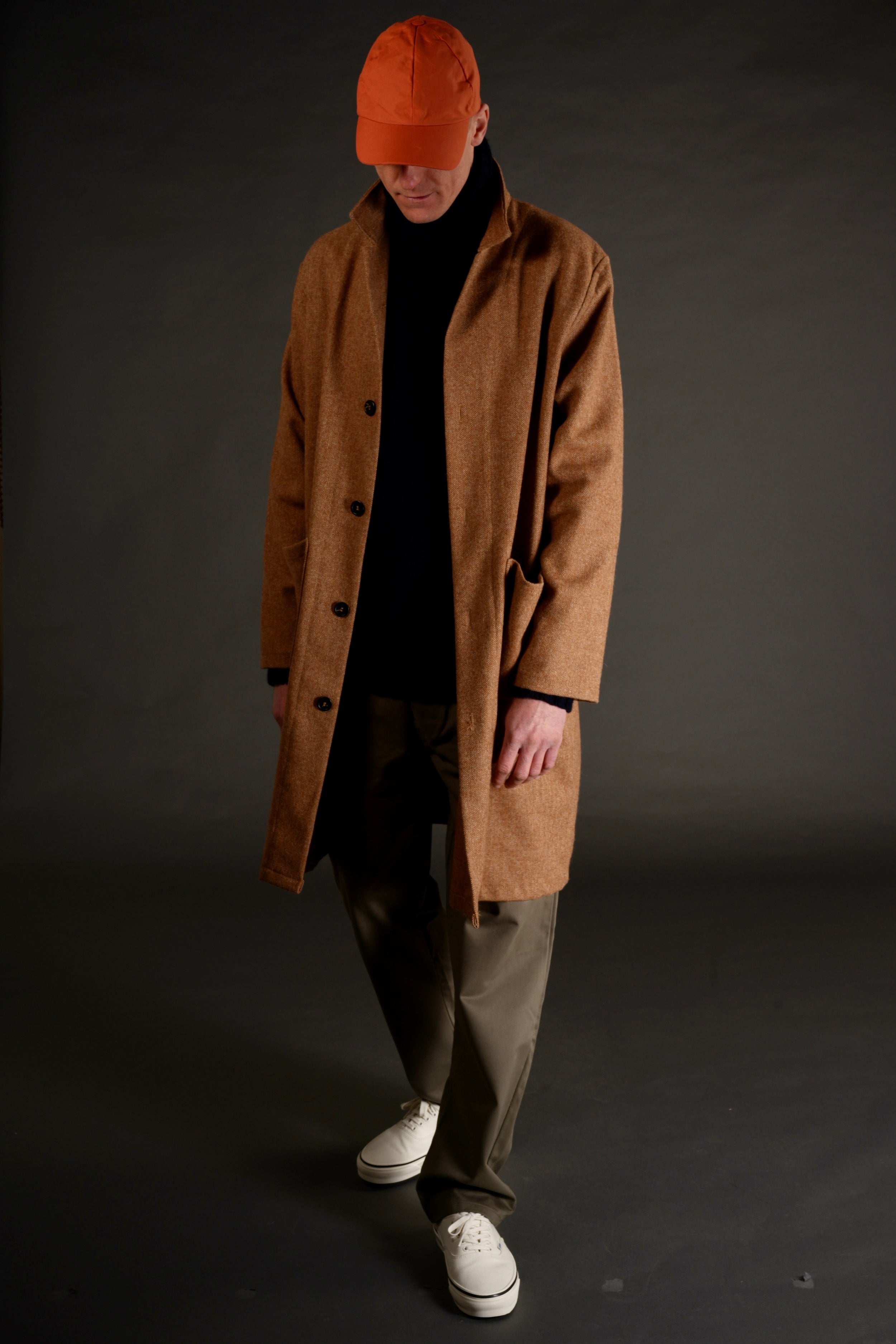 Tommy is 6'4" tall and wears a size L