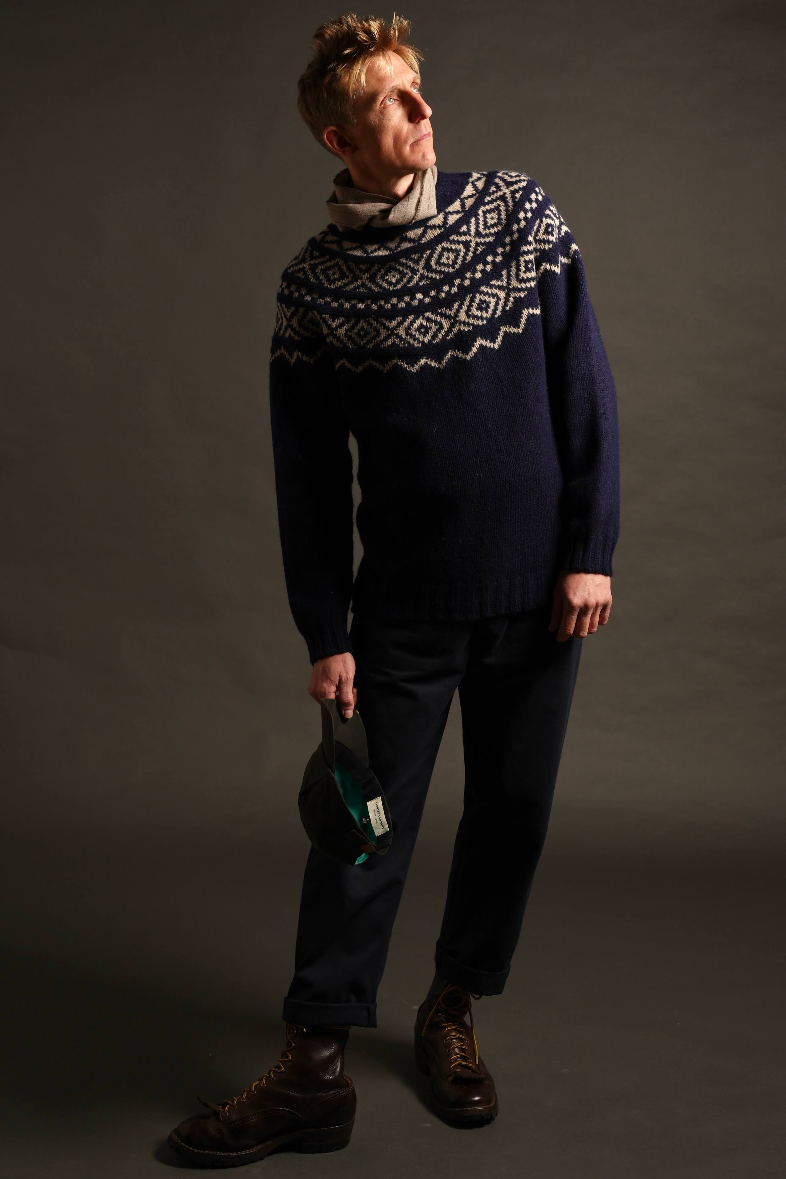 Tommy is 6'4" and wears an XL jumper