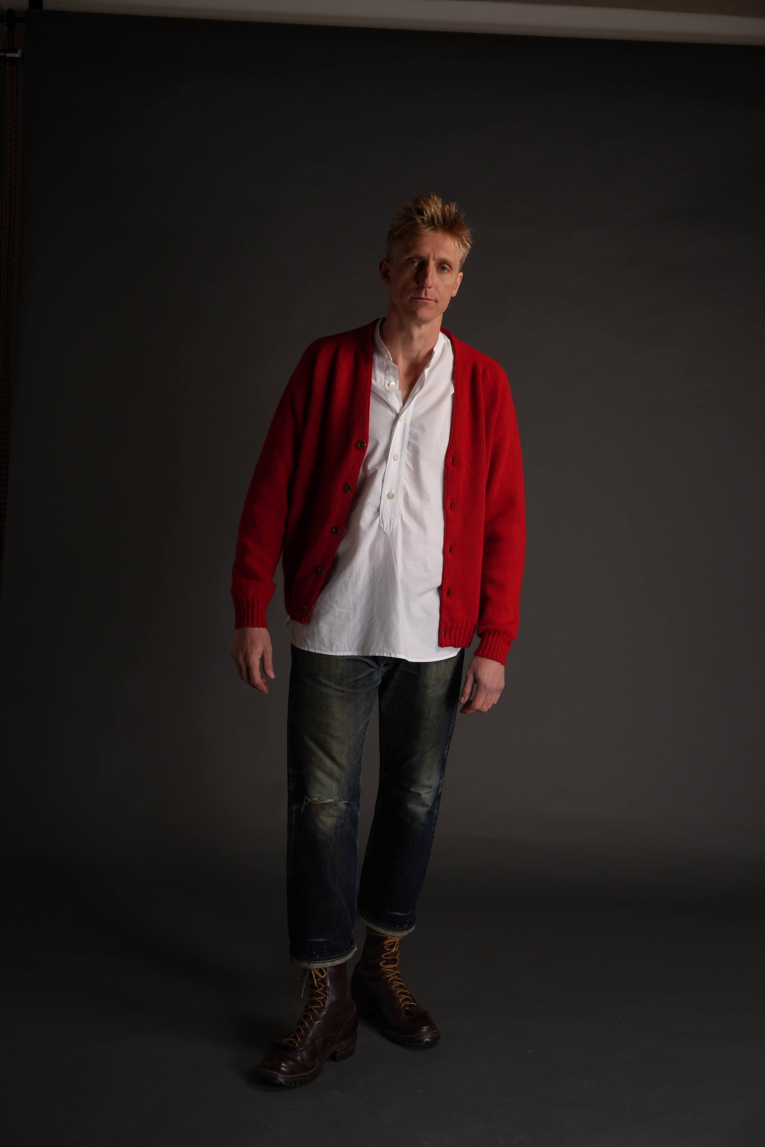 Tommy Wears Carrier Company Cardigan in Ruby