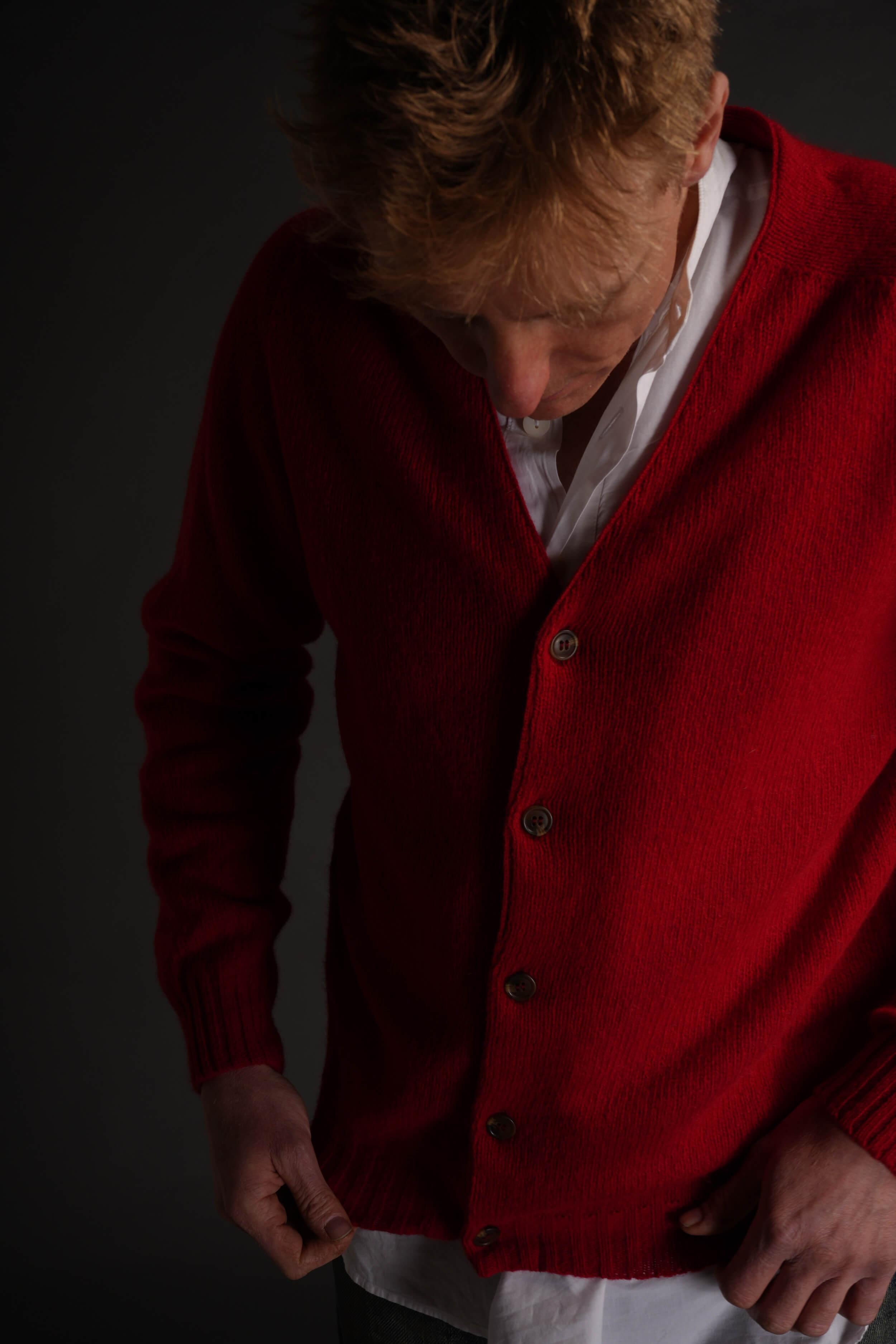 Tommy Wears Carrier Company Cardigan in Ruby