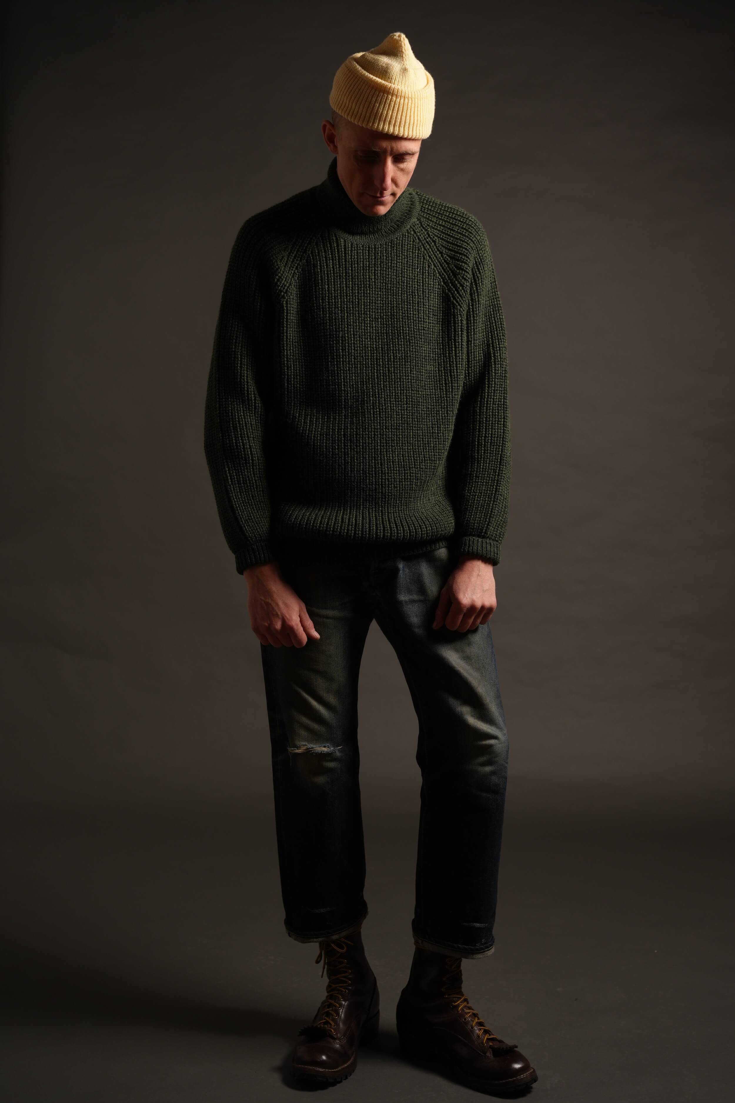 Tommy is 6'4" and wears an XL jumper