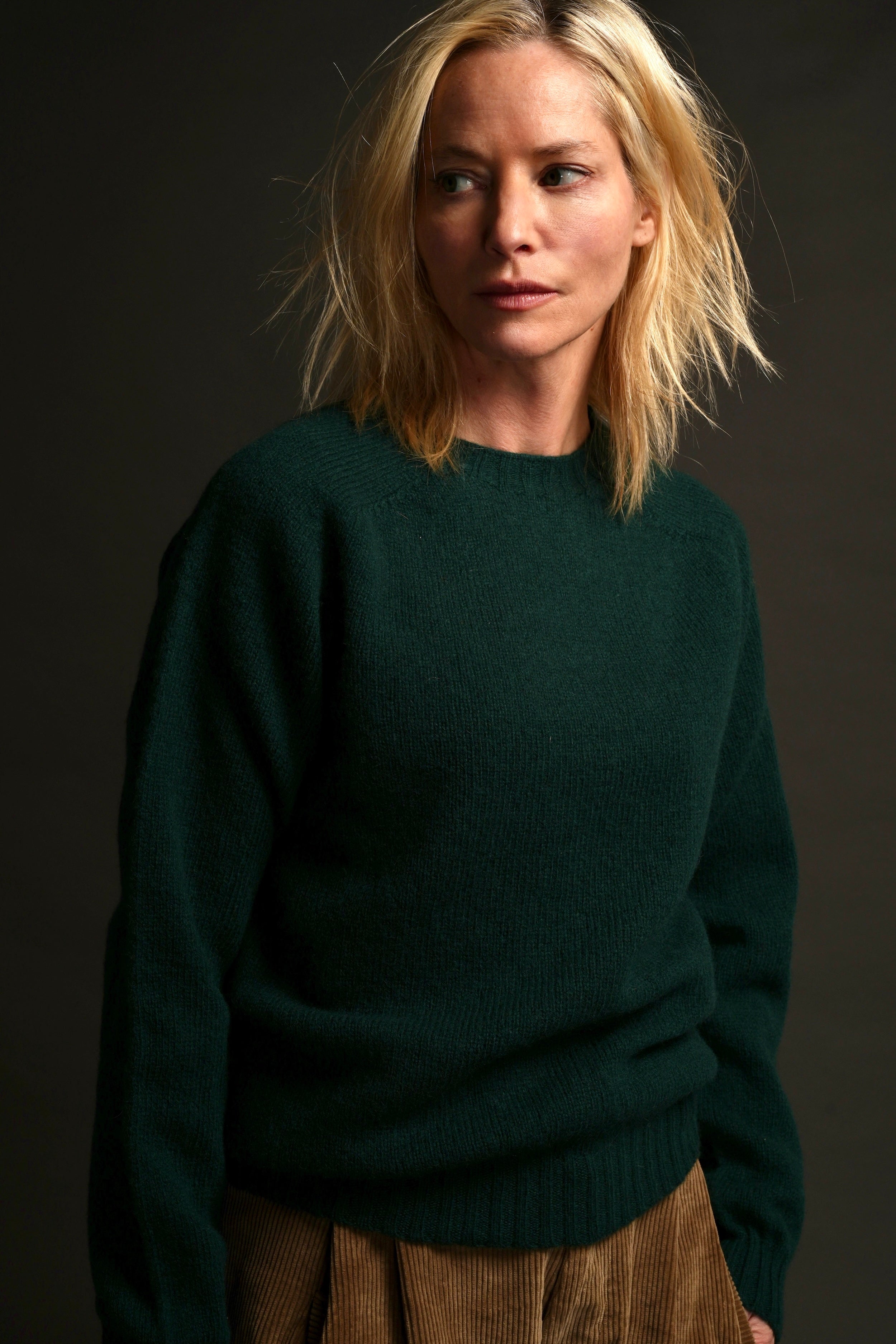 Sienna wears Pine Shetland Wool Jumper and Dutch Trouser in Sand Corduroy