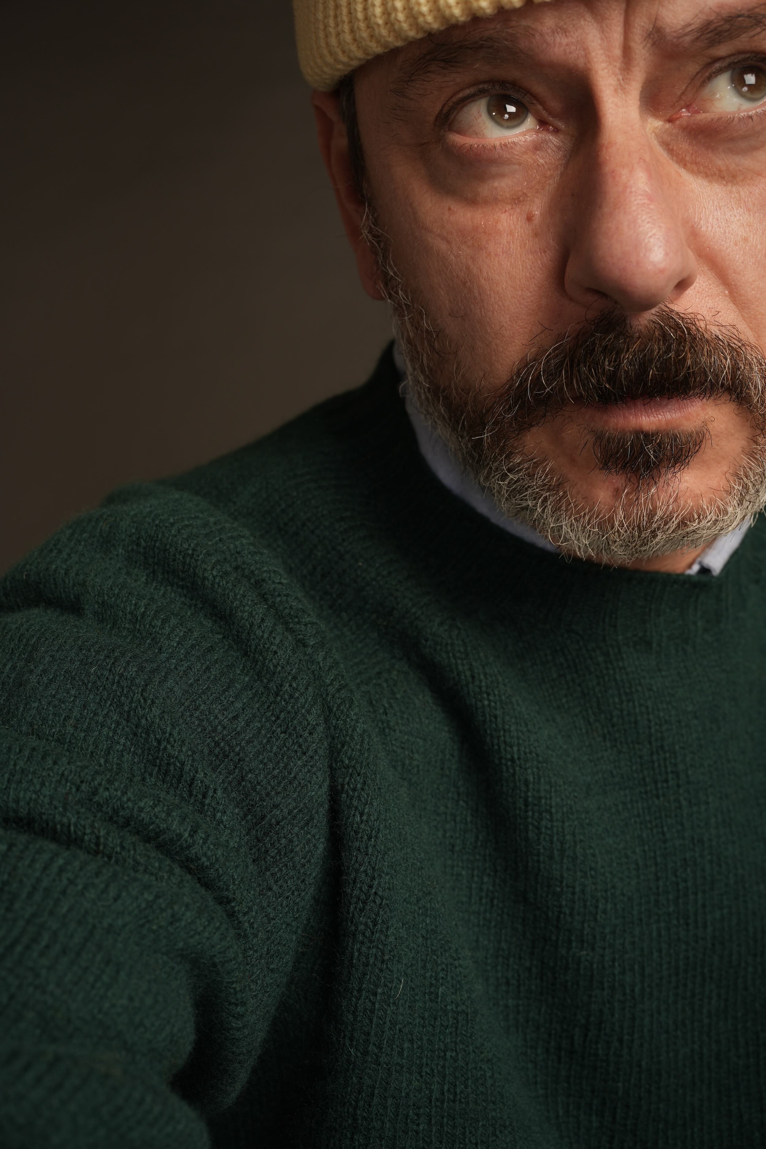 Enzo is 6'1" and wears an XL jumper