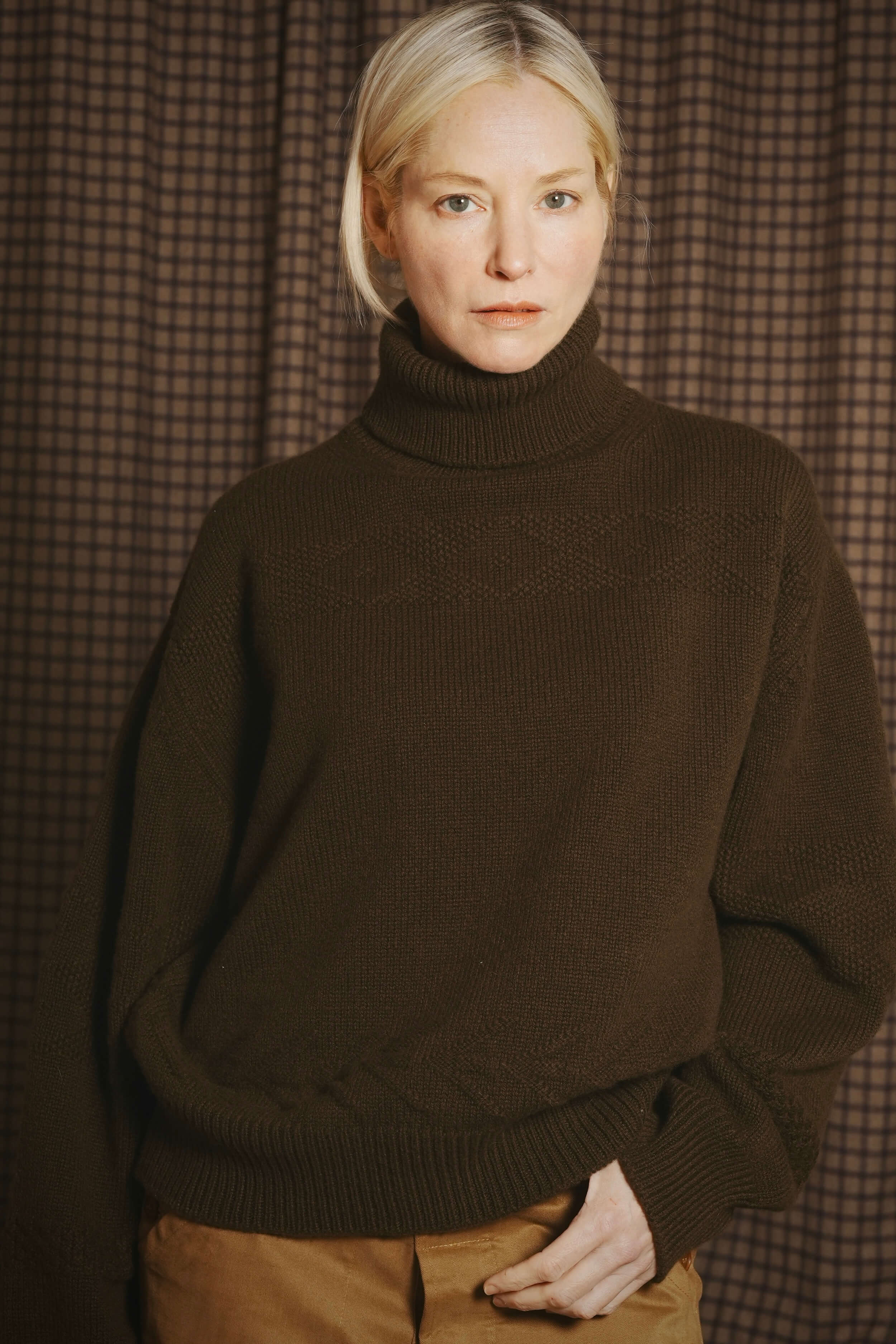 Sienna Wears Carrier Company Textured Polo Neck In Military