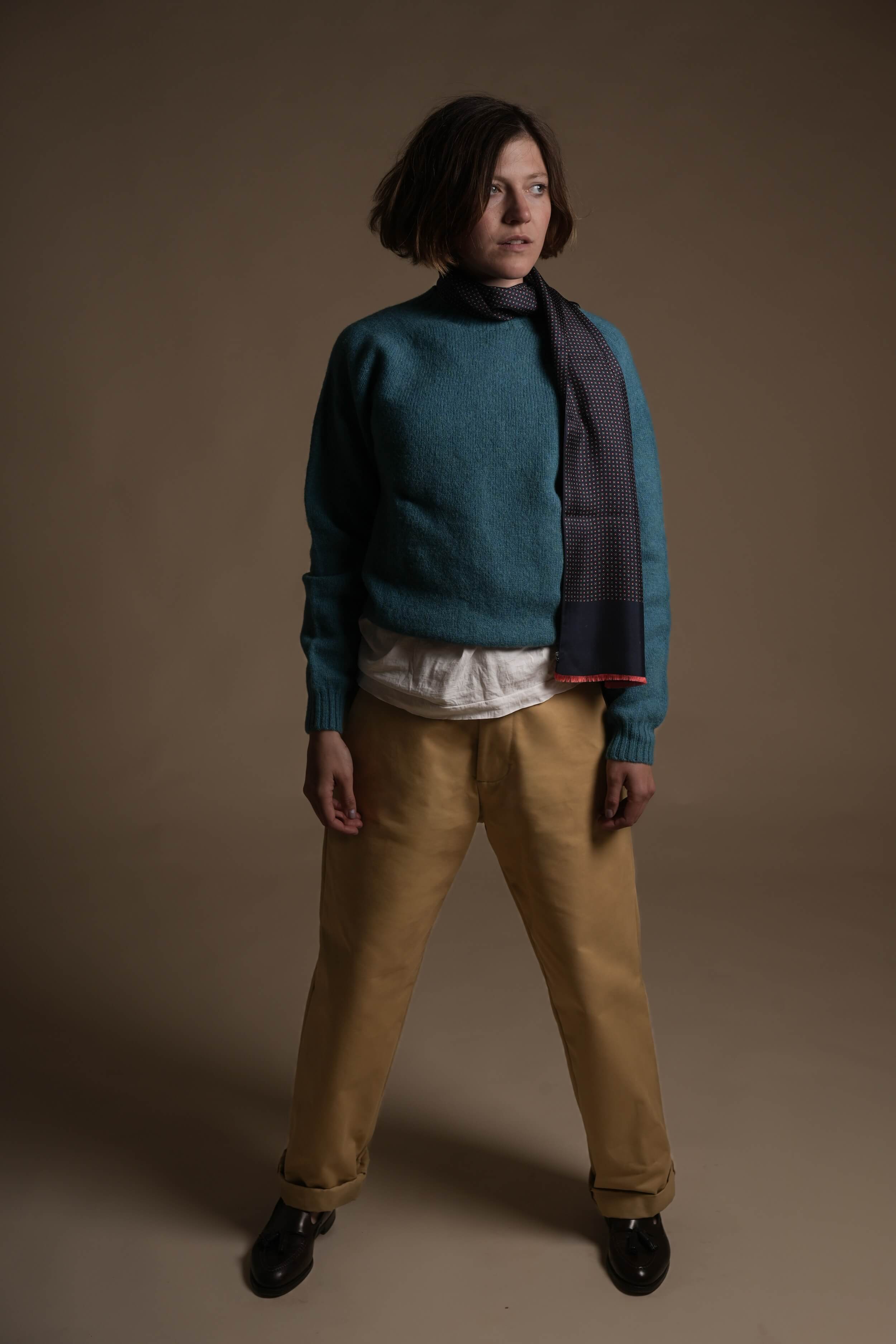 Minna is 5'8", a size 10 and wears a Small jumper