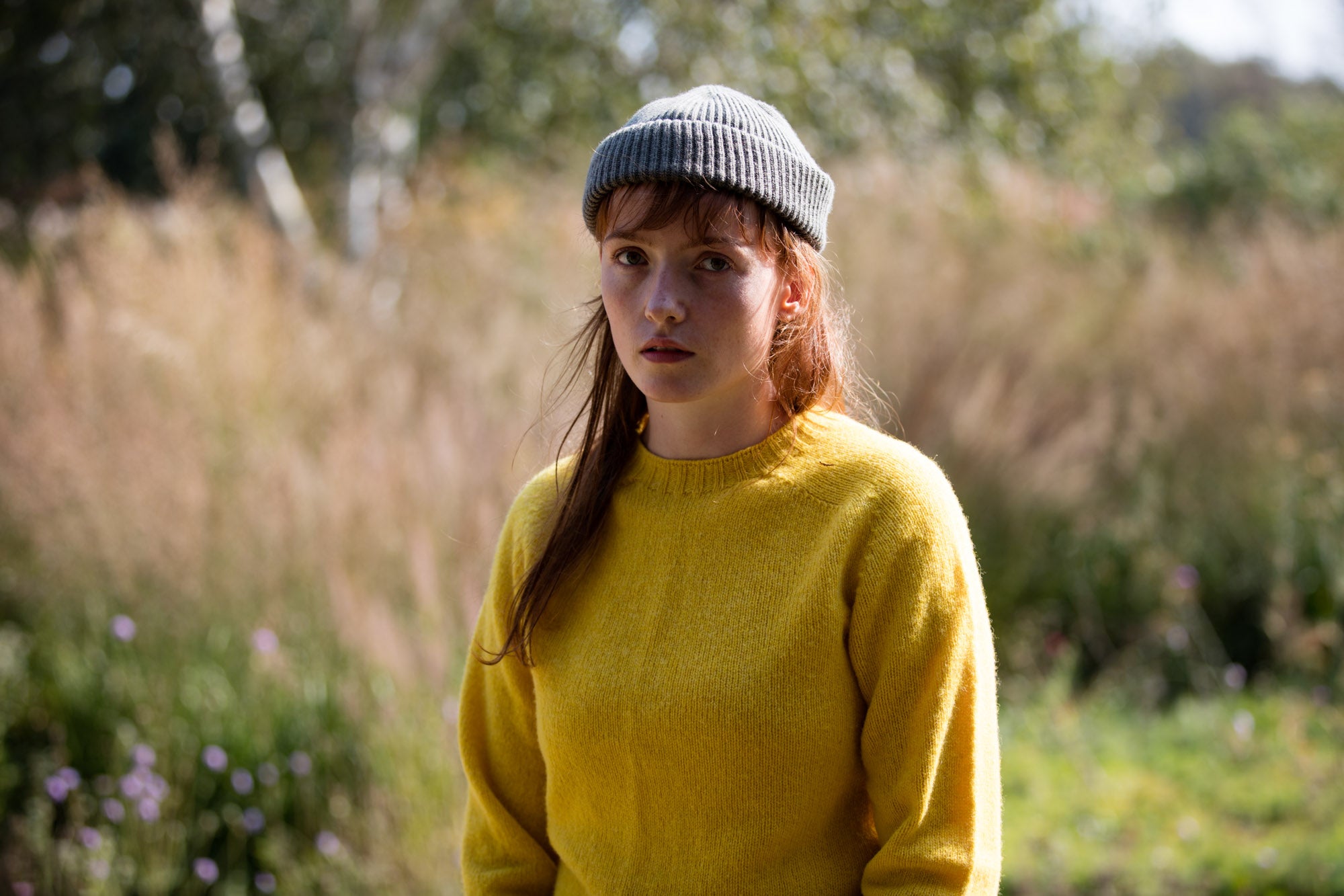 Woman Wears Carrier Company Shetland Lambswool Jumper In Acid Yellow