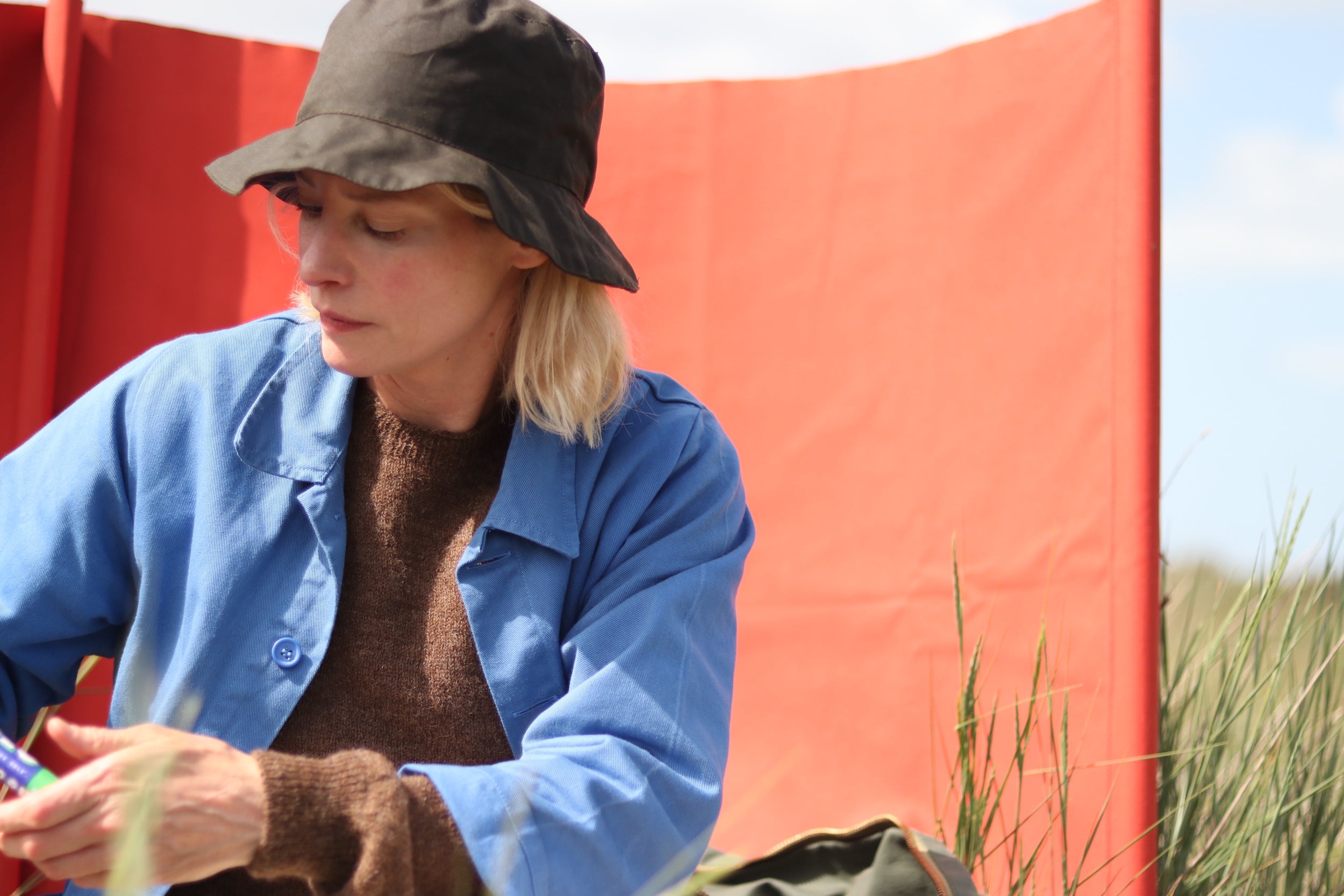Sienna wears Carrier Company Lightweight Voe True Shetland Jumper in Chestnut