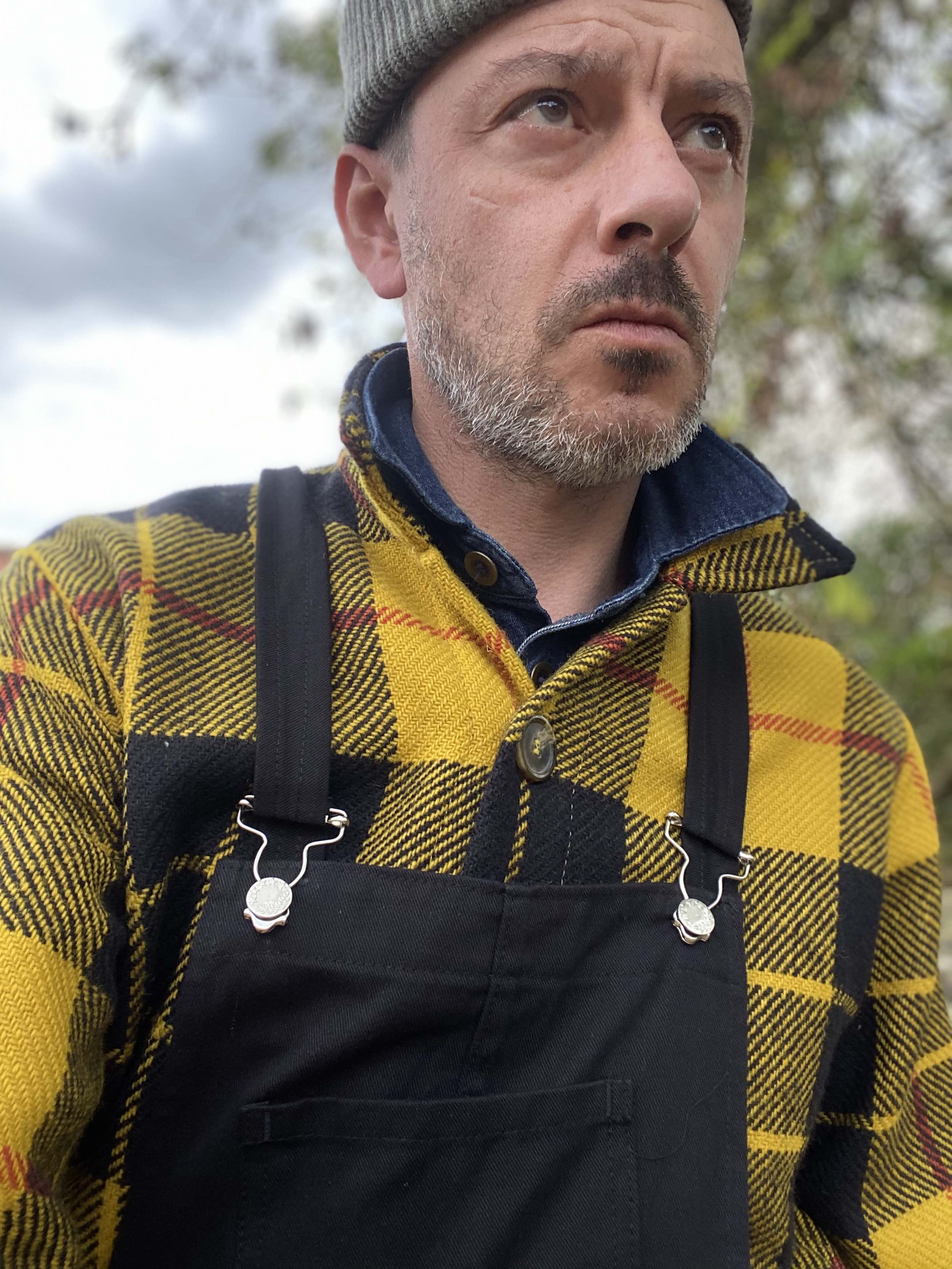 Man wearing Carrier Company Dungarees and Celtic Wool Jacket