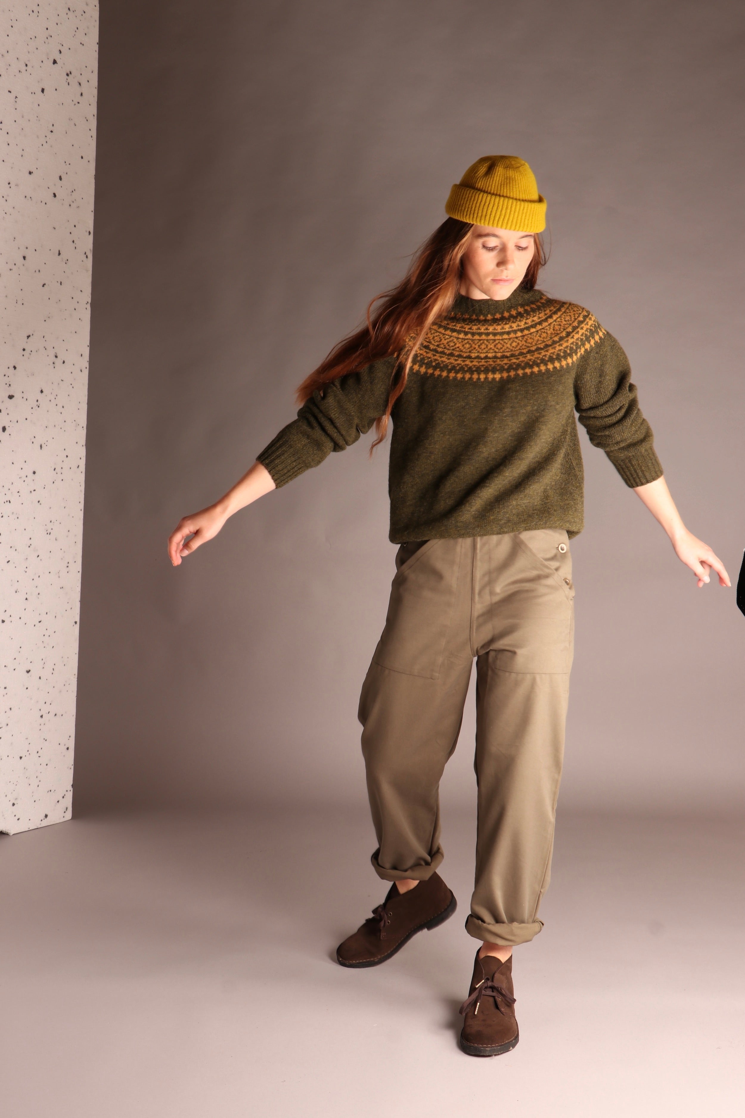 Decca wears Carrier Company Shetland Lambswool Yoke Jumper with Women's Work Trouser and Wool Hat