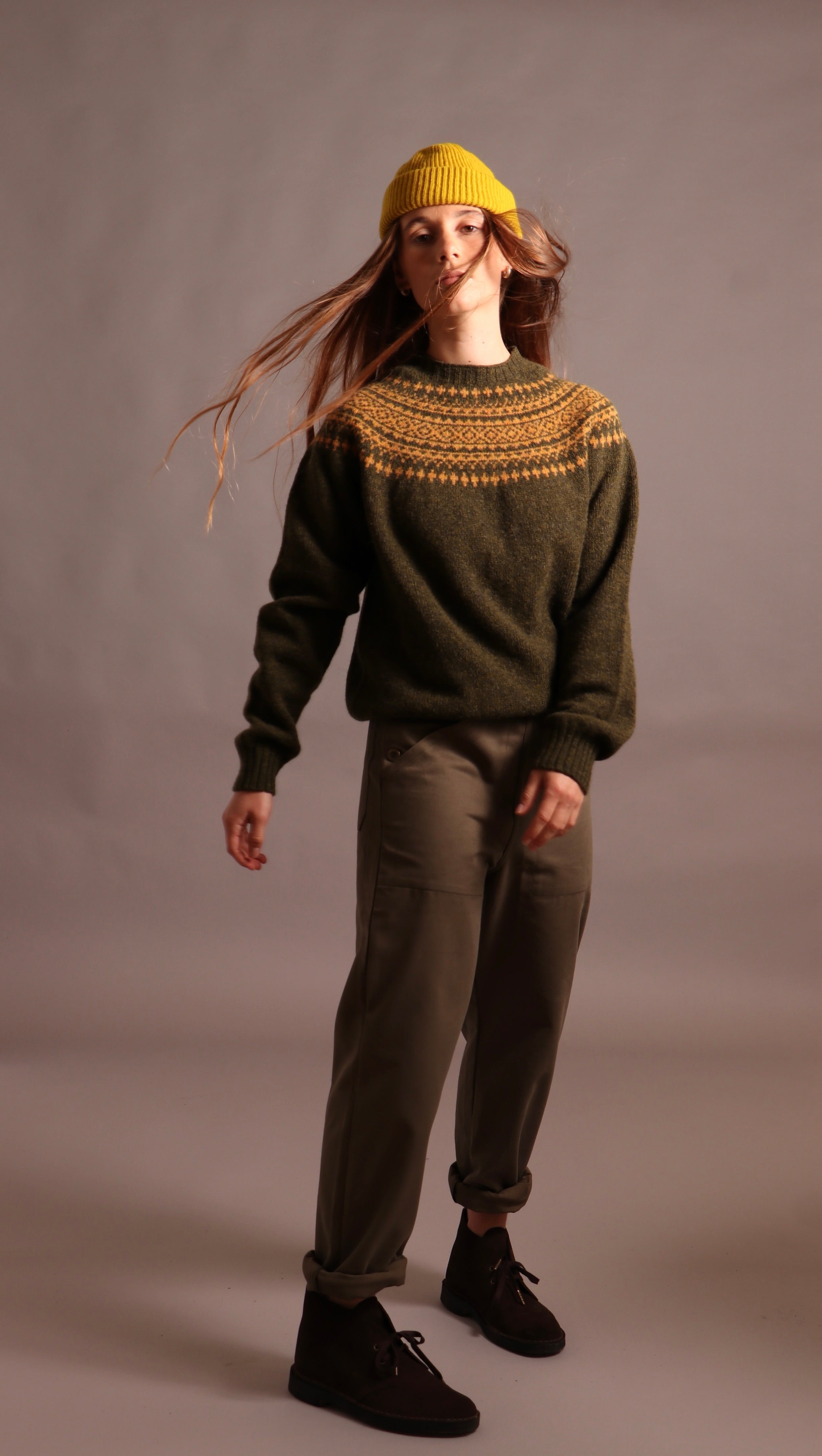 Decca wears Carrier Company Shetland Lambswool Yoke Jumper with Women's Work Trouser and Wool Hat