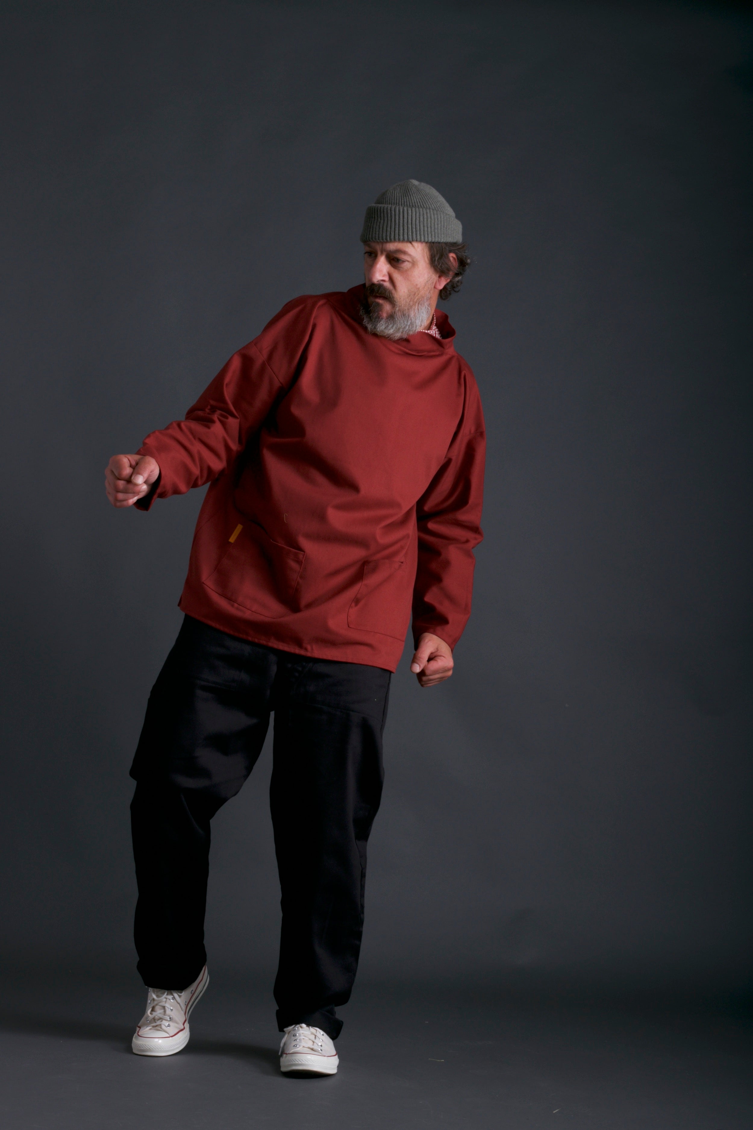 Man wearing Carrier Company Traditional Norfolk Slop in Breton Red with Black Work Trouser and Olive Drab Wool hat