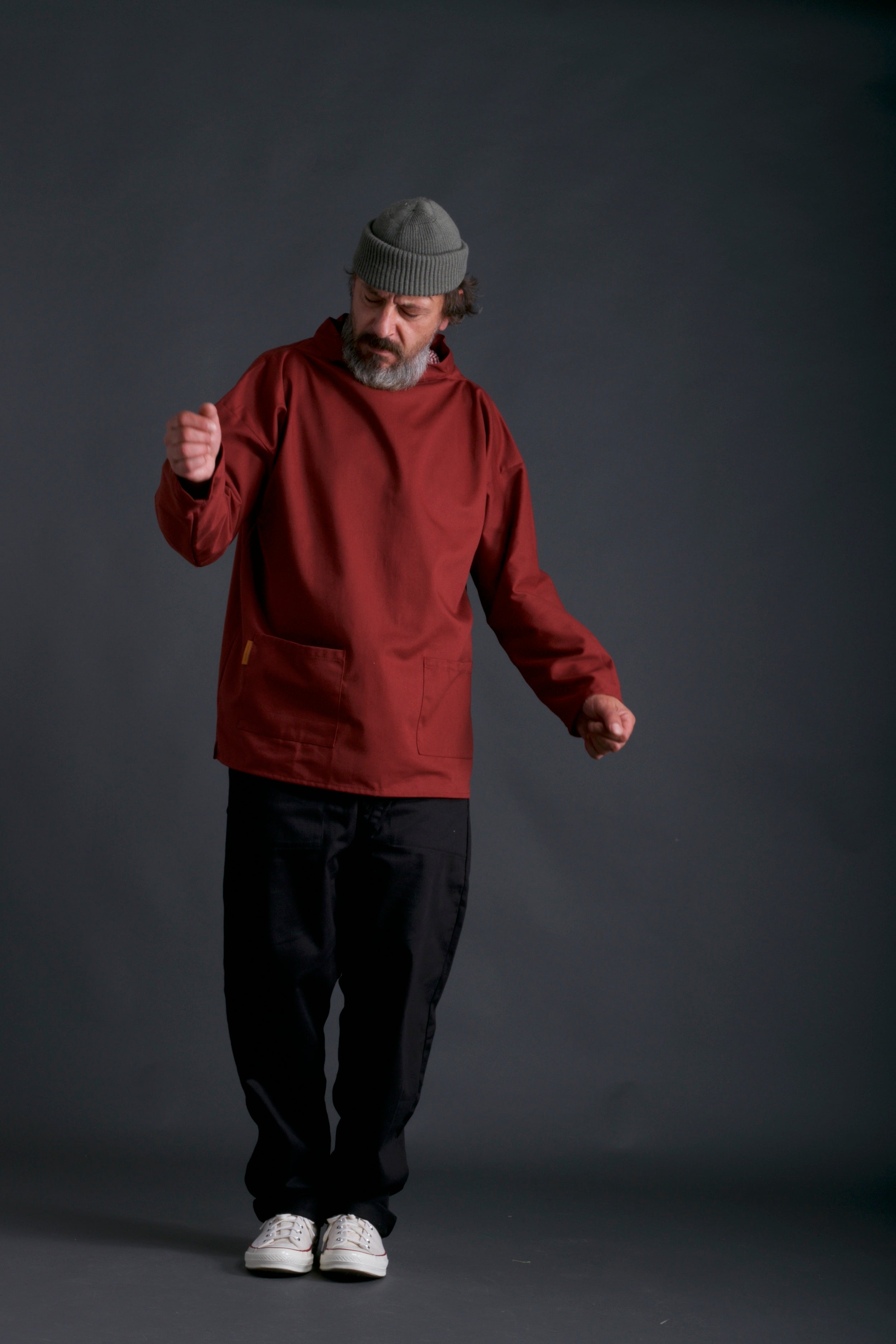 Man wearing Carrier Company Traditional Norfolk Slop in Breton Red with Black Work Trouser and Olive Drab Wool hat