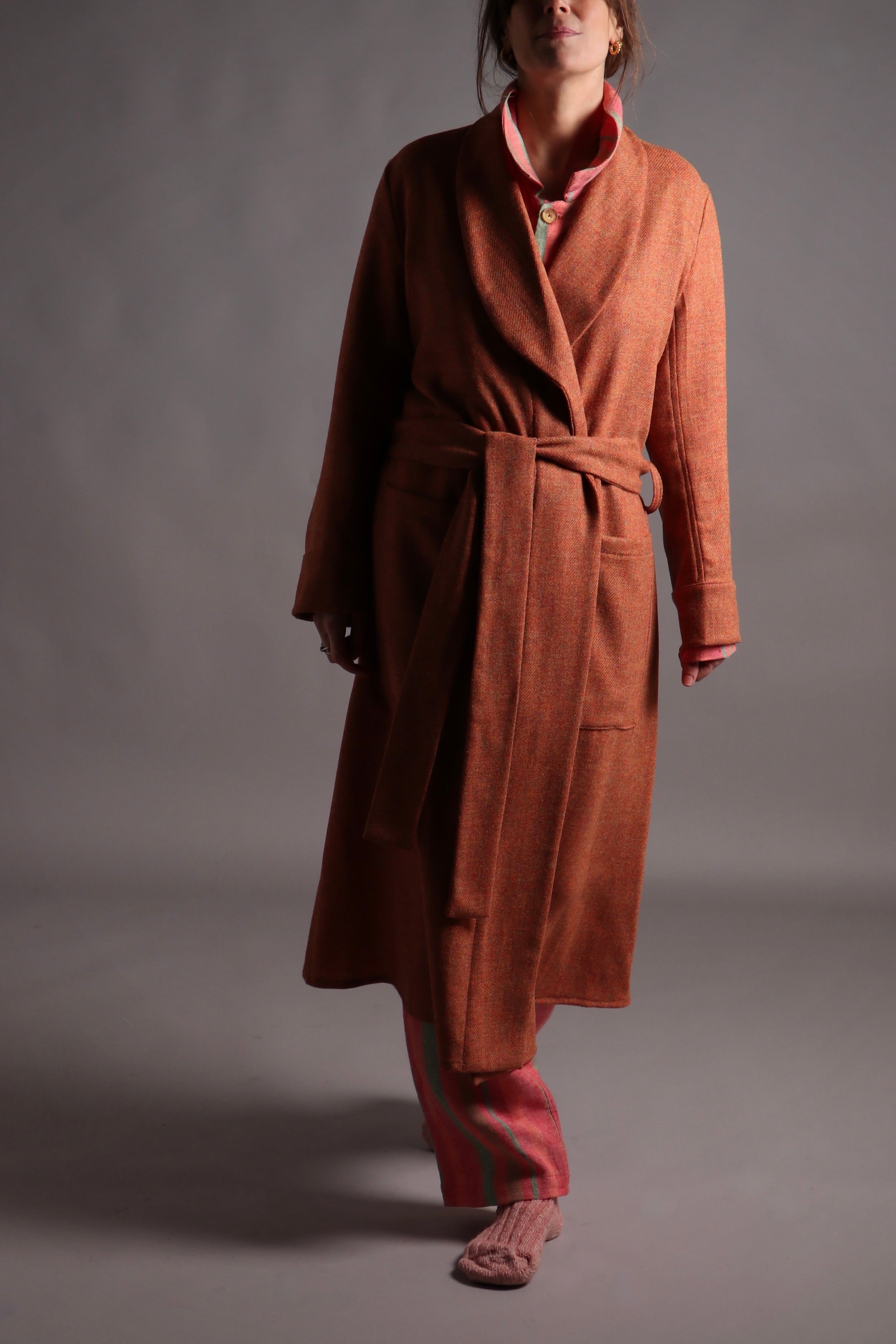 Kate wears Carrier Company Wool Dressing Gown in Amber and Striped Linen Pyjamas