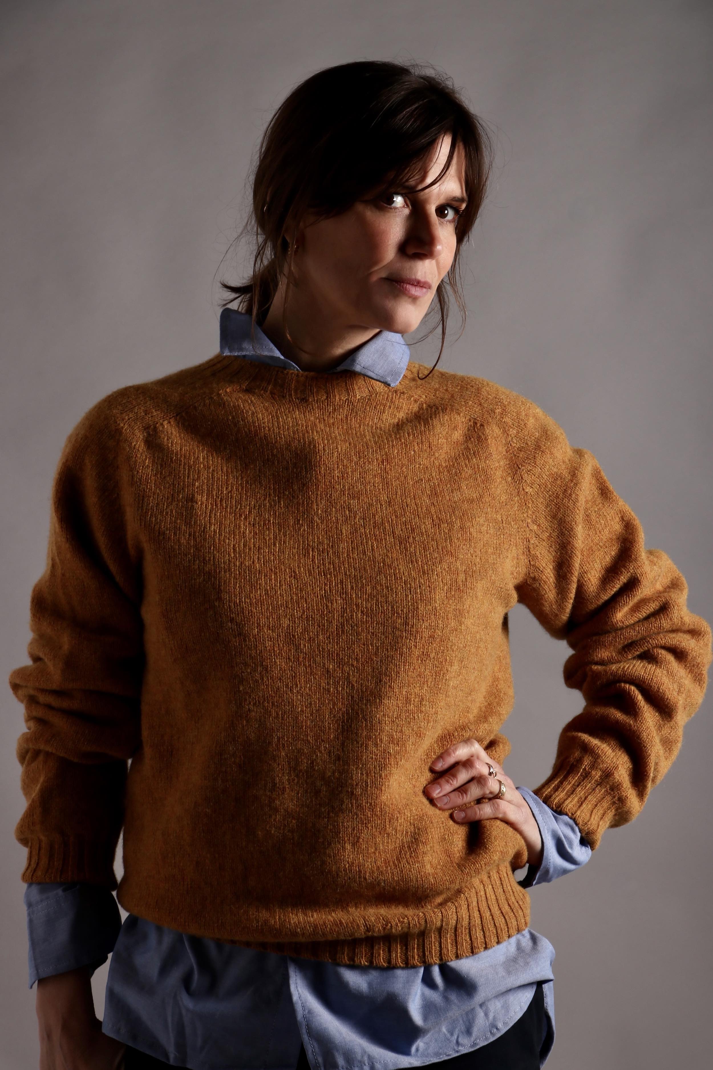 Kate wears Carrier Company Shetland Lambswool Jumper in Cumin