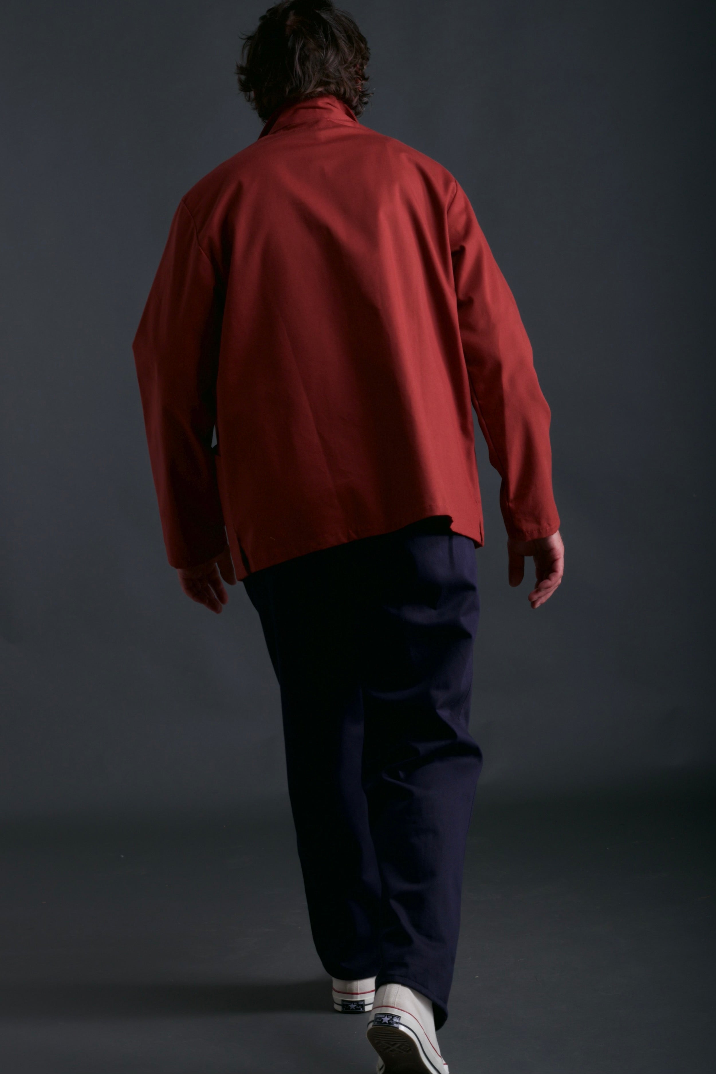 Man wears Carrier Company Traditional Work Jacket in Breton with Chambray Shirt and Classic Trouser in Navy