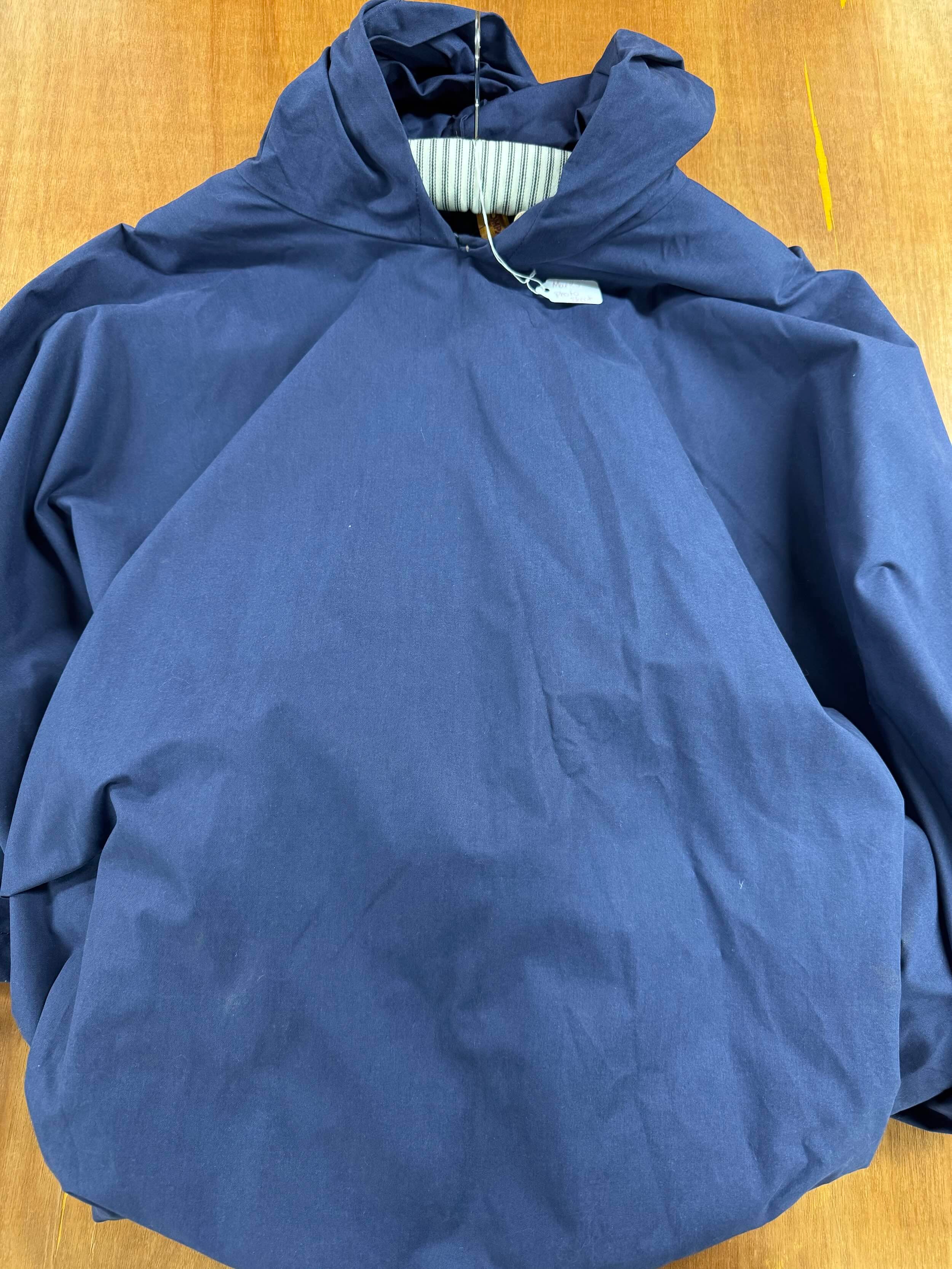 Carrier Company navy blue hooded rain cape in navy blue.