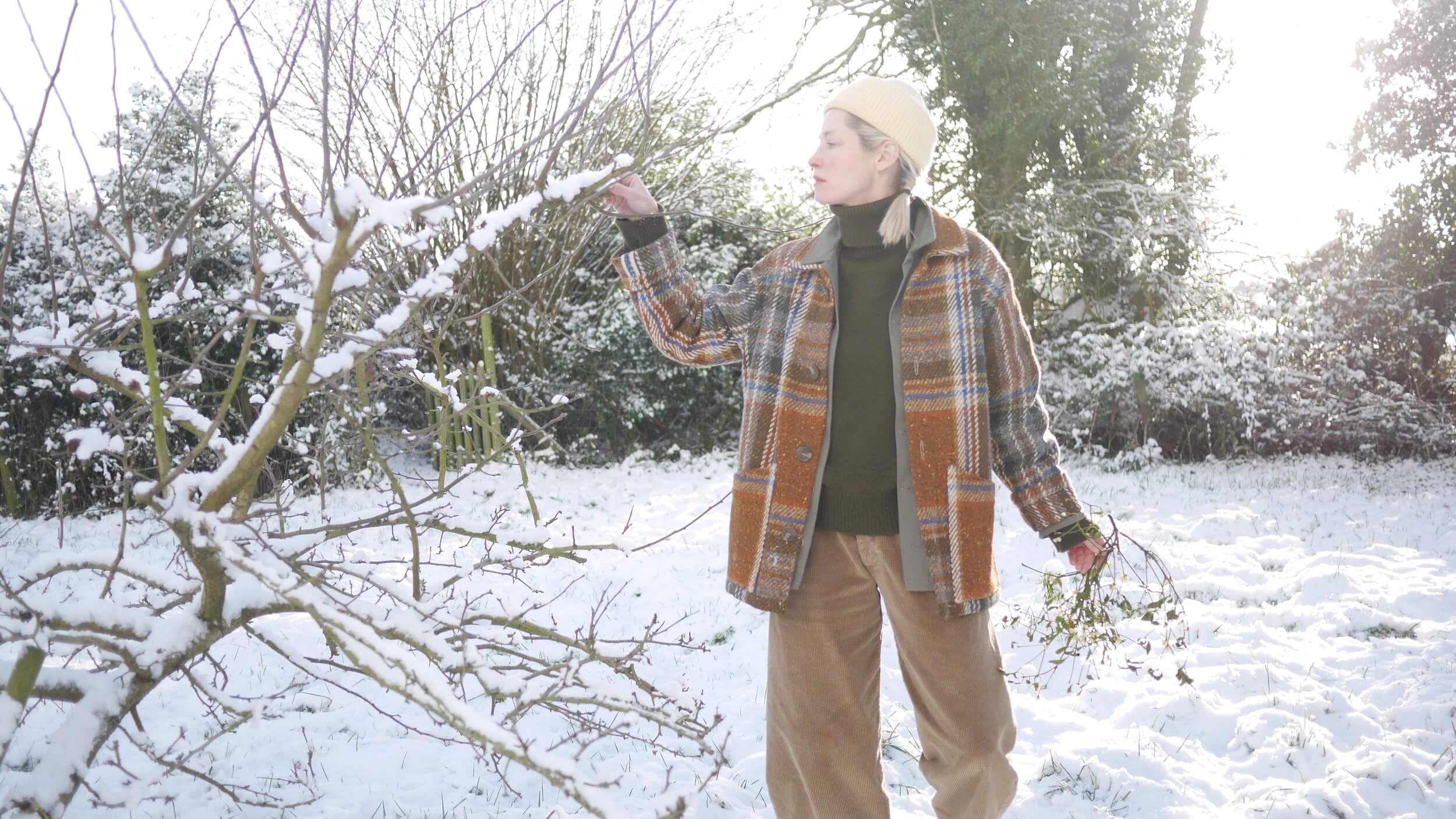 Sienna Wears Carrier Company Textured Polo Neck In Military