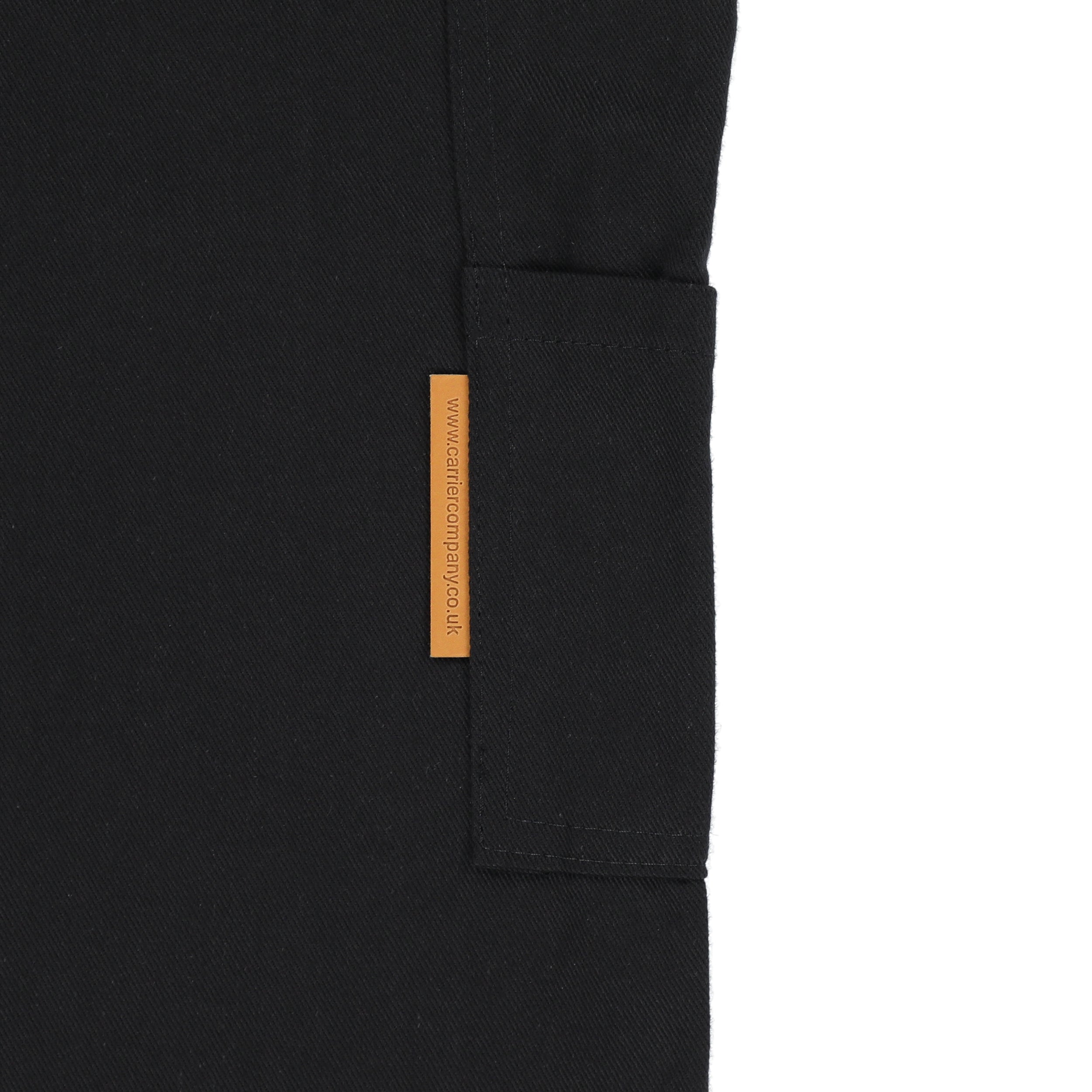 Close up of the pocket detail on the Carrier Company Men's Dungarees in Black