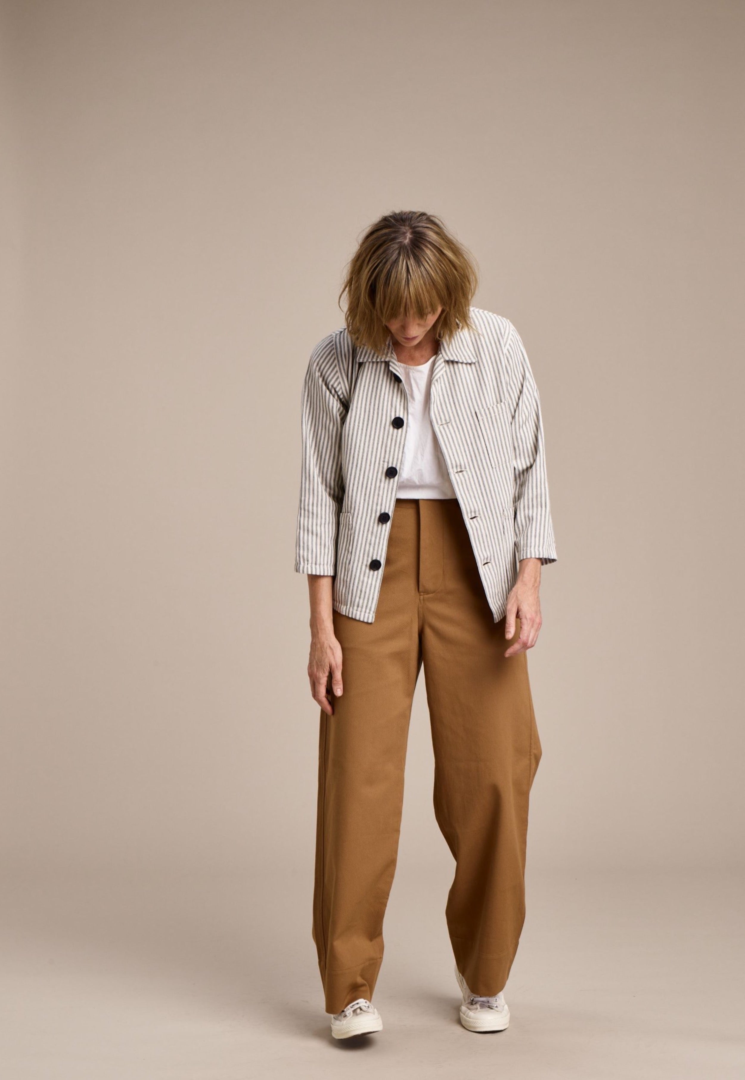 Woman wearing Carrier Company Ticking Work jacket and Cotton Tee