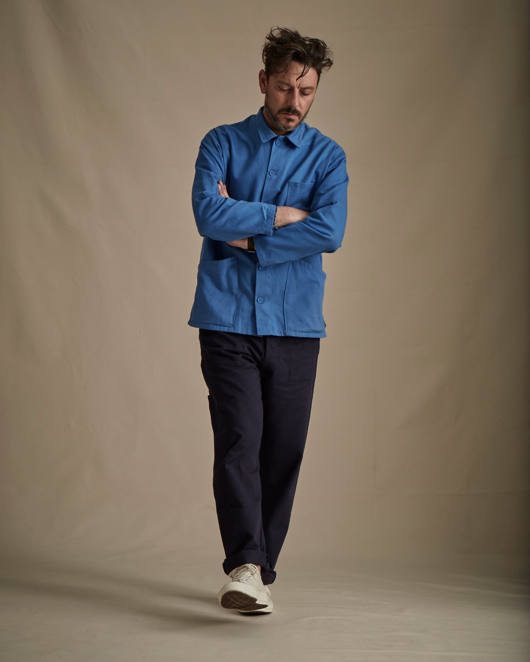 Man wearing Carrier Company Men's Work Trouser in Navy with Norfolk Work Jacket