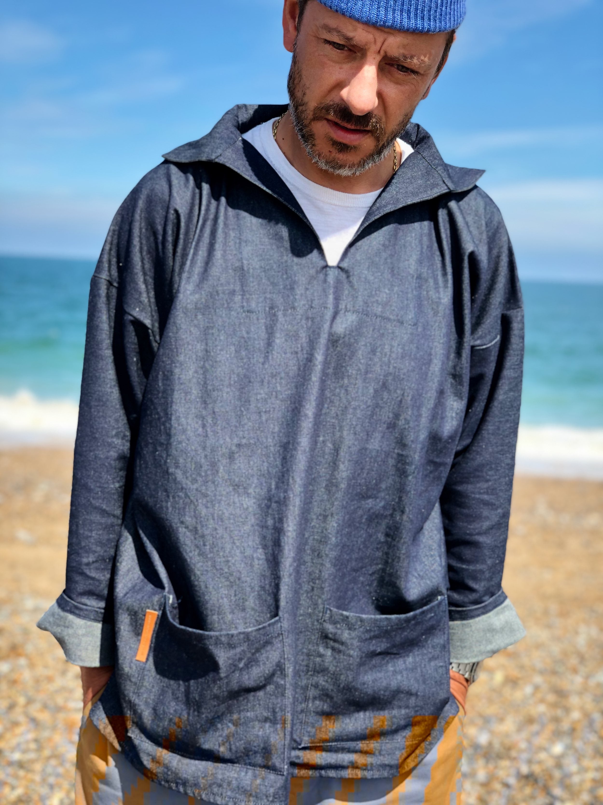 man wearing Carrier Company V-Neck Smock in Denim