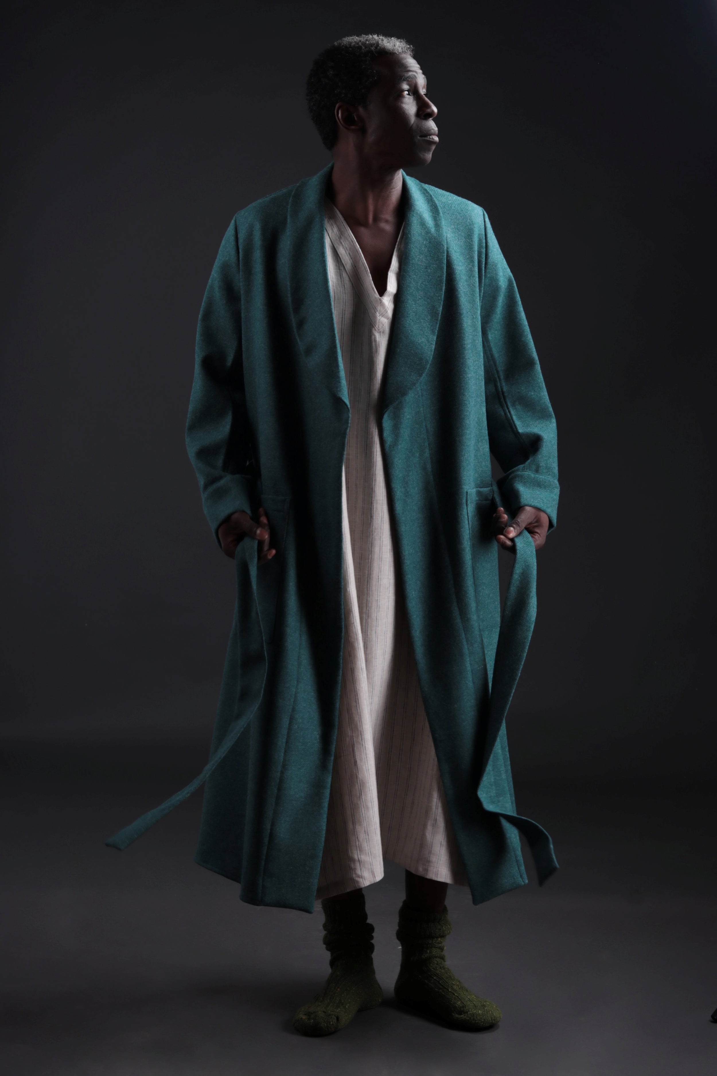 Man wears Carrier Company Wool Dressing Gown in New Teal