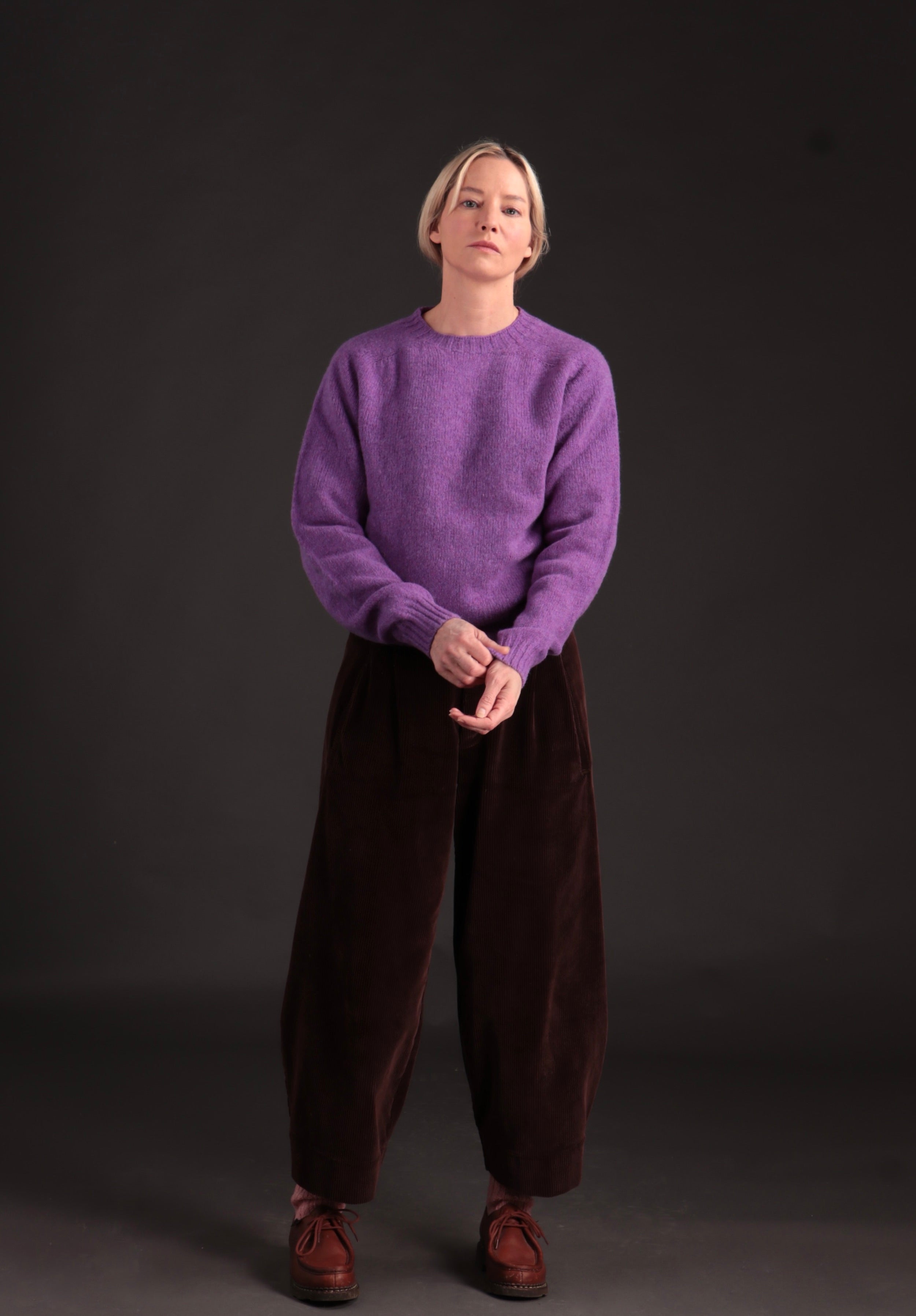 Sienna wears Carrier Company Dutch Trouser with Shetland Lambswool Jumper in Allium