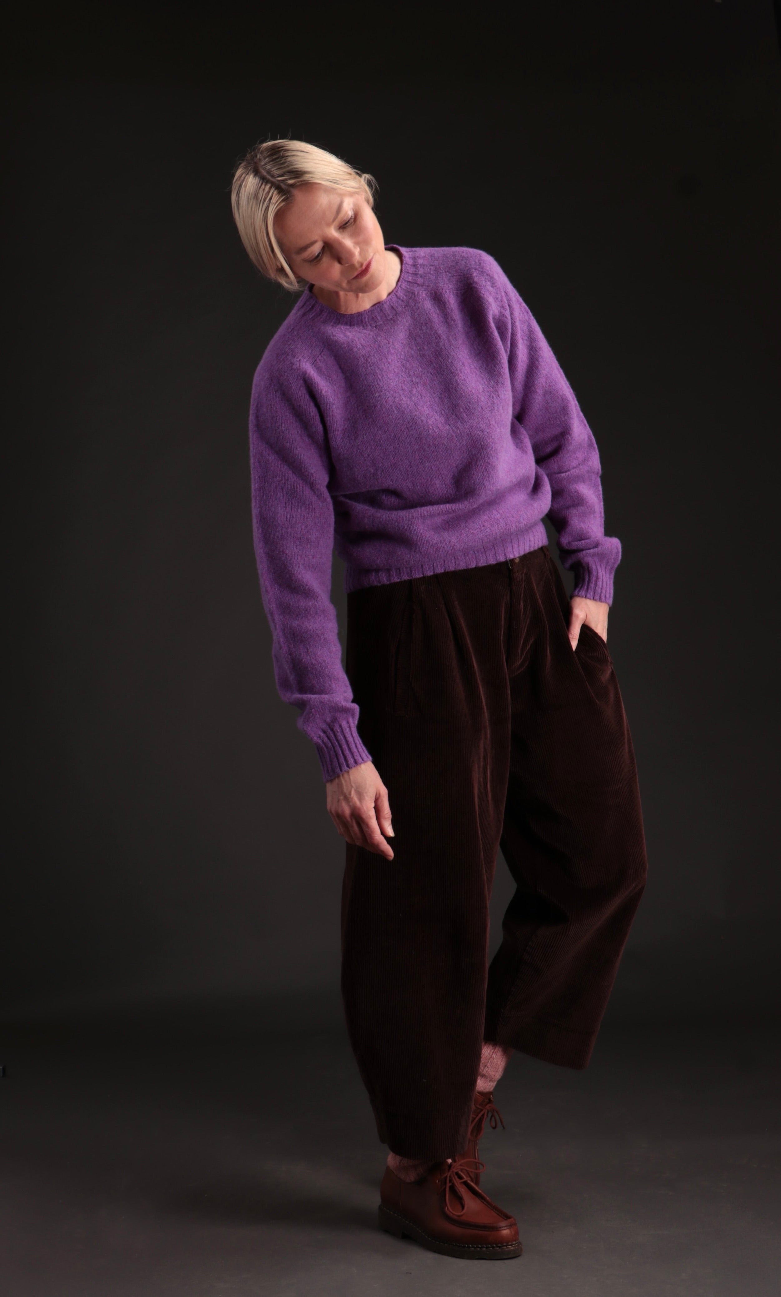 Sienna wears Carrier Company Dutch Trouser with Shetland Lambswool Jumper in Allium