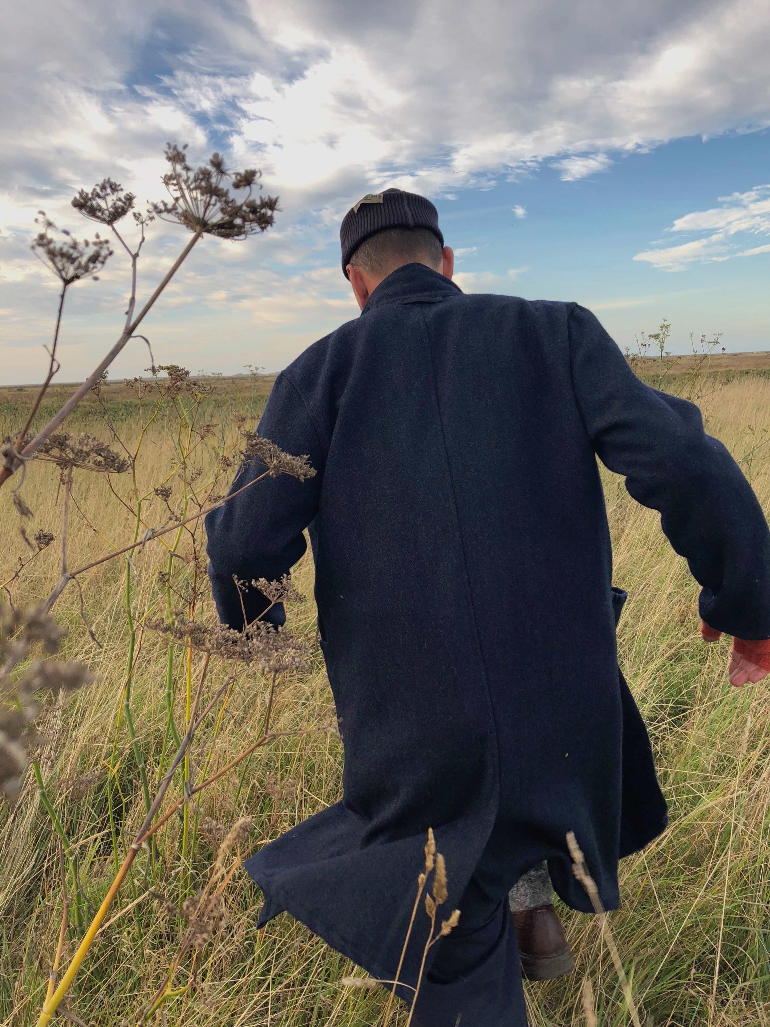 Man wearing Carrier Company Wool Coat in Navy