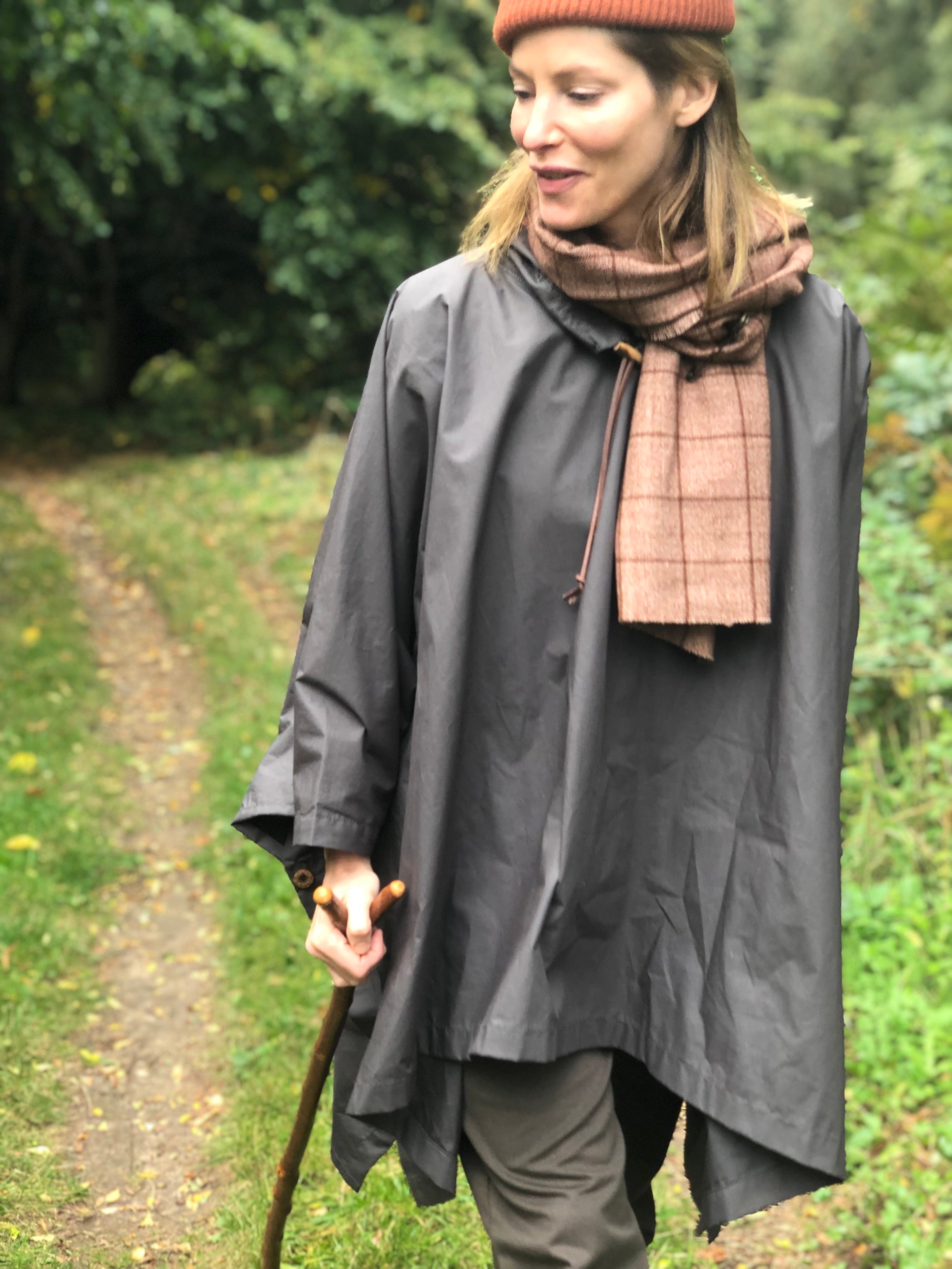 Woman wearing Carrier Company Rain Cape with Wool hat and Short Scarf