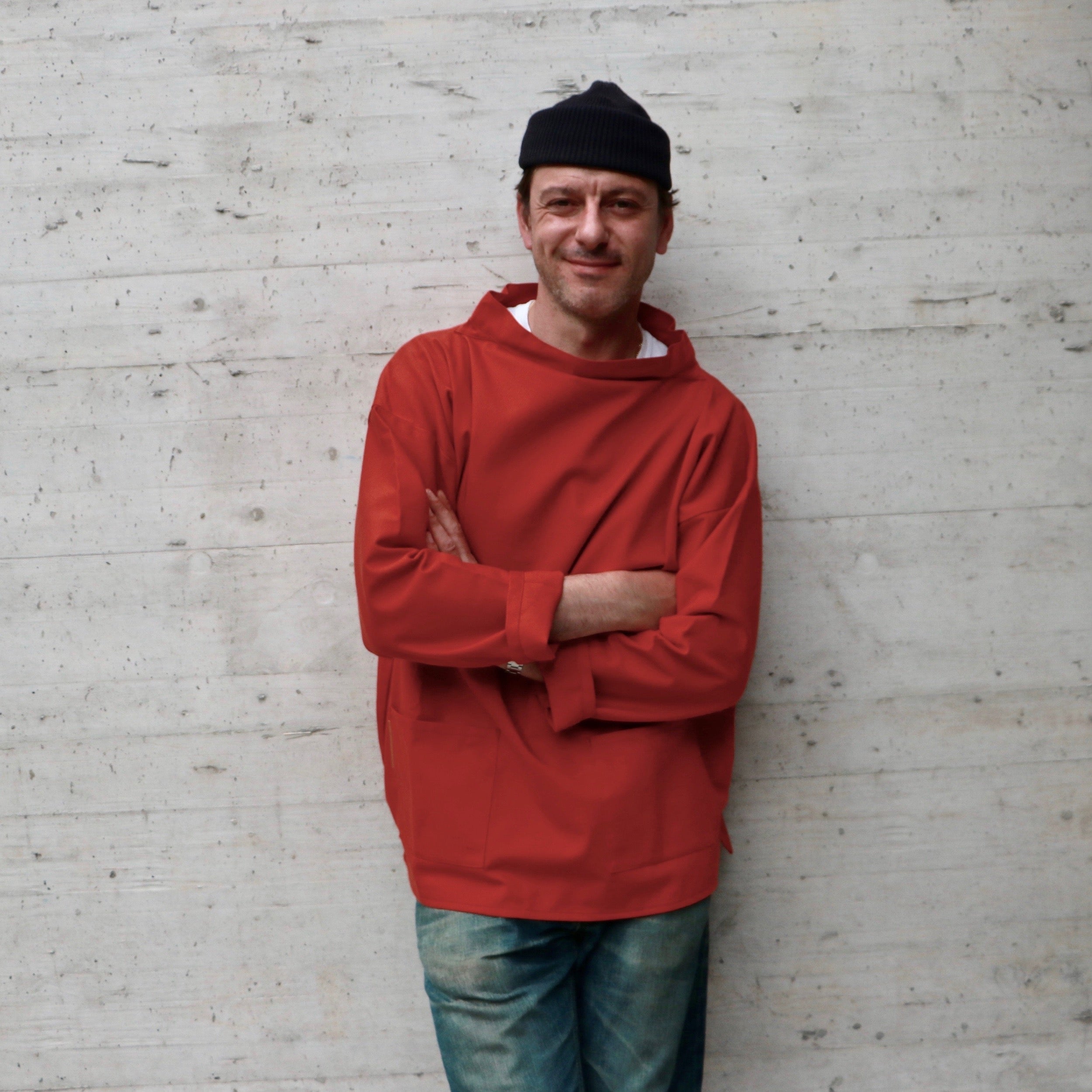 Man wearing Carrier Company Traditional Norfolk slop in Orange with Wool Hat