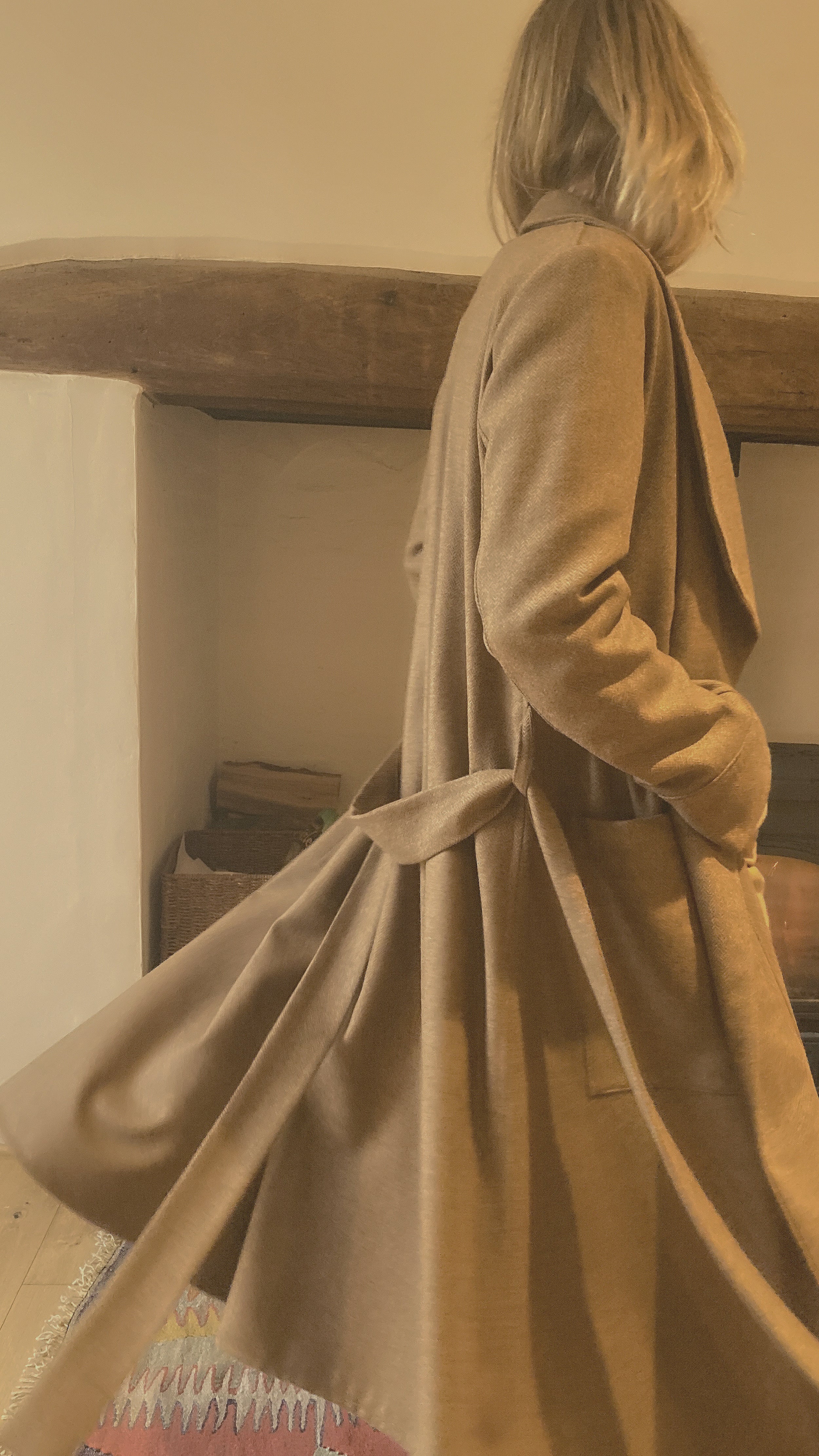 Woman wearing Carrier Company Wool Dressing Gown in Tan Herringbone