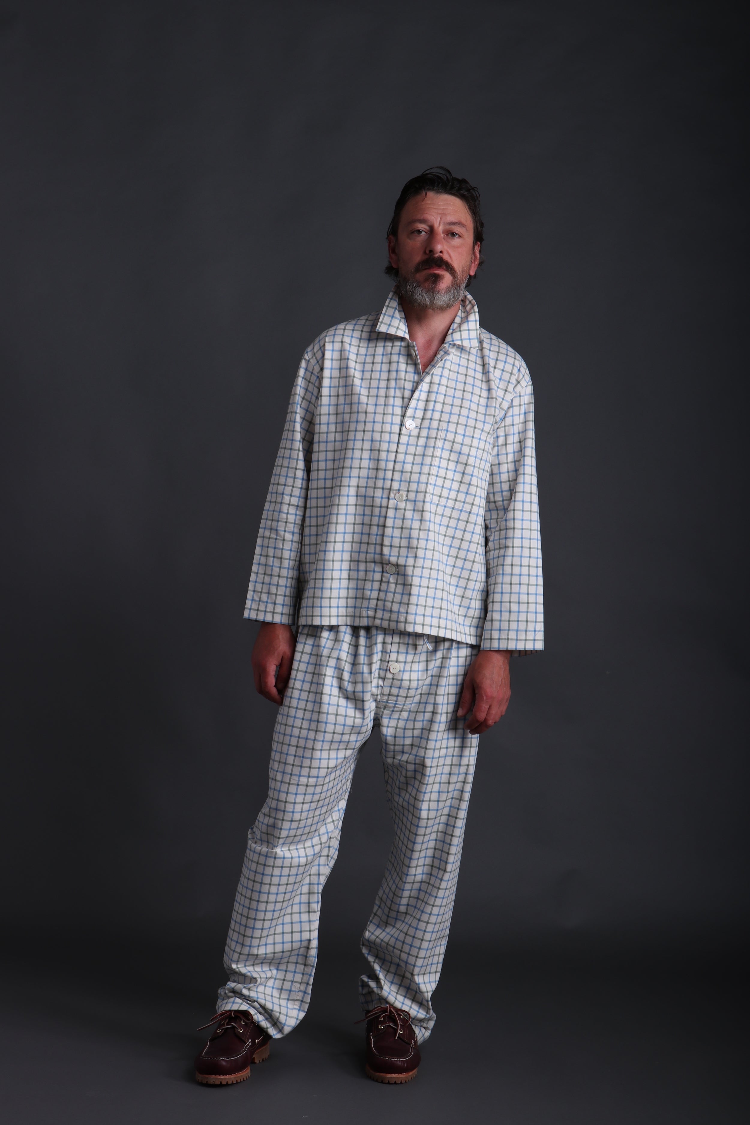 Man wears Carrier Company Superior Cotton Pyjama in Blue and Green Check