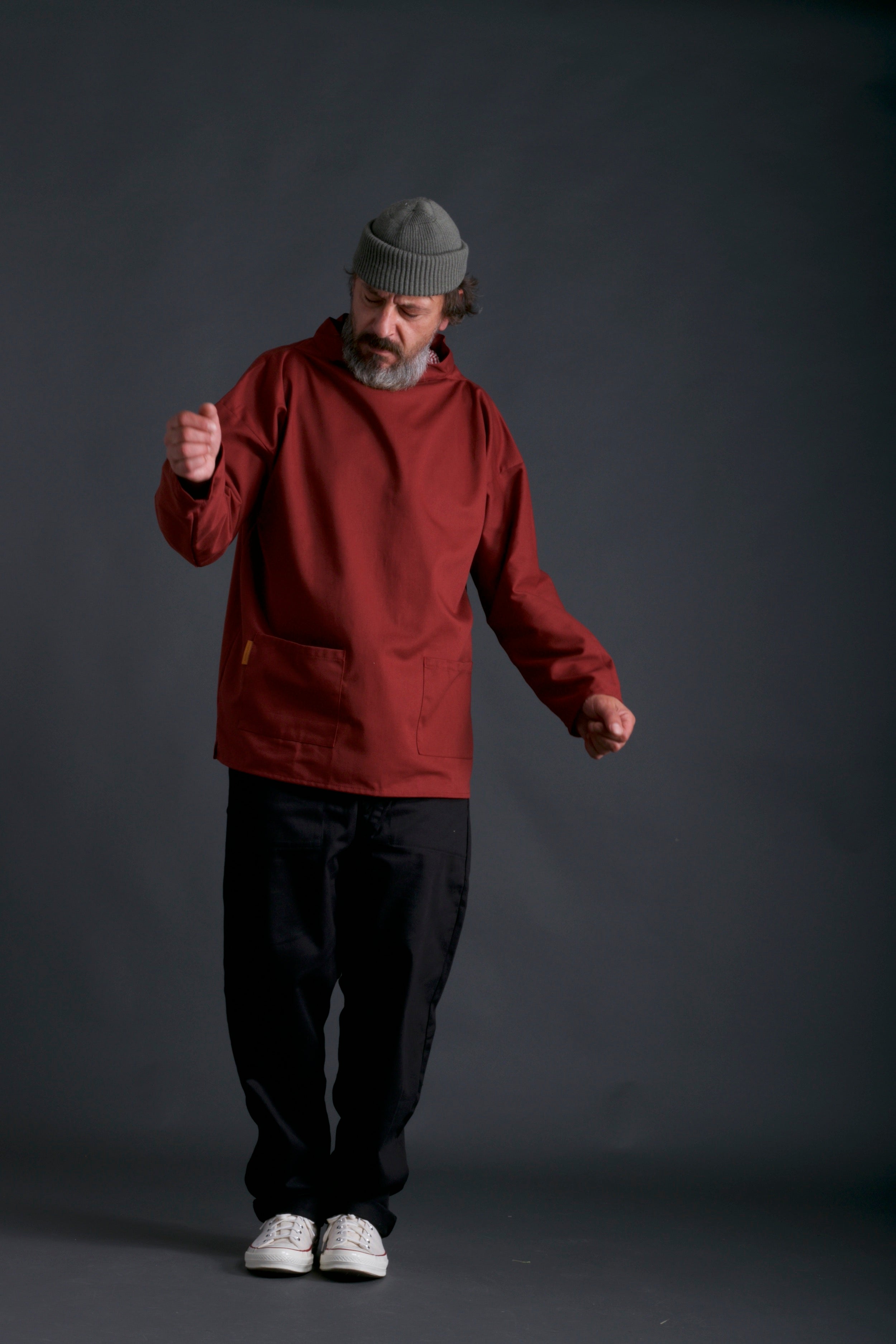 Man wearing Carrier Company Traditional Norfolk Slop in Terracotta with Black Work Trouser and Olive Drab Wool hat