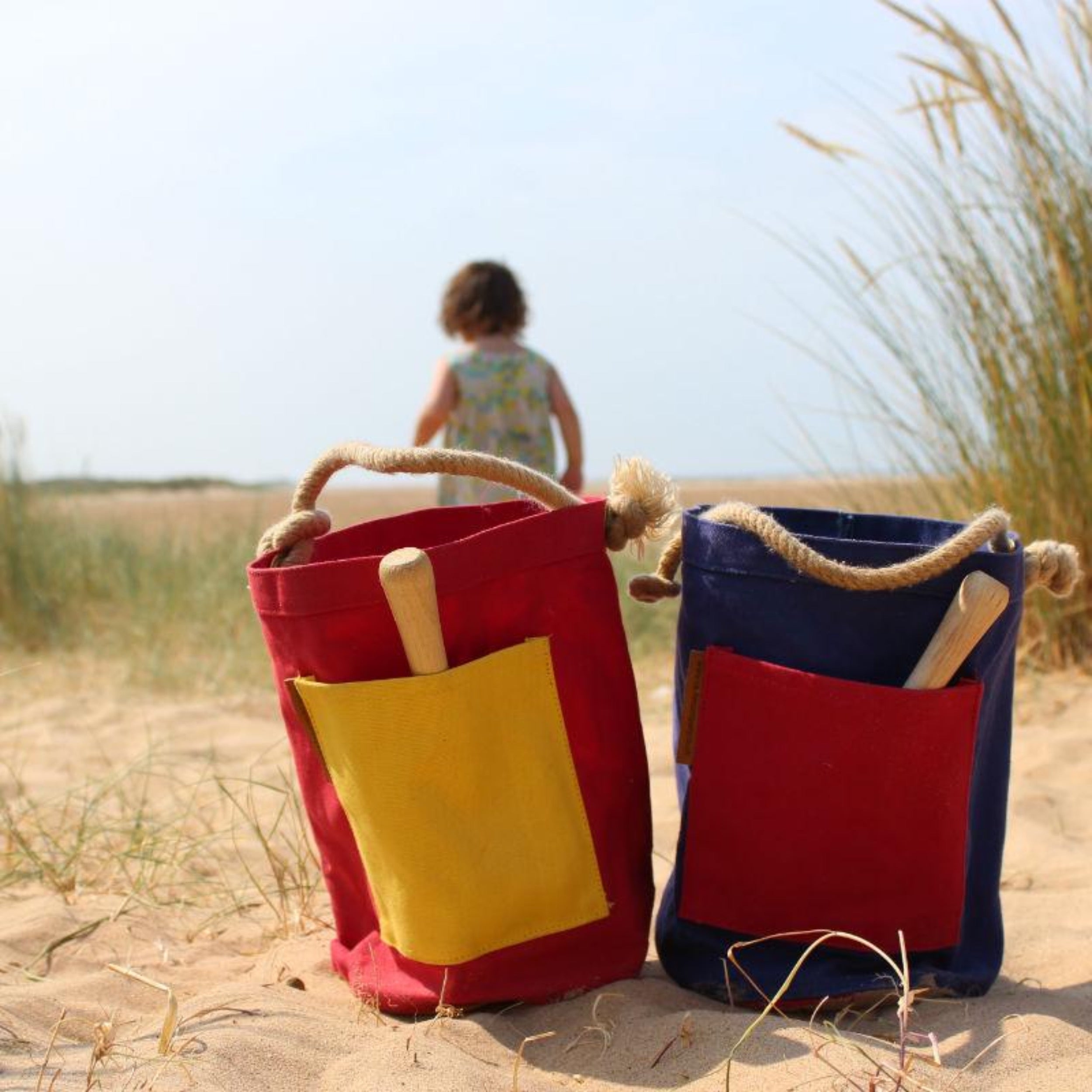 Carrier Company Canvas Toy Buckets on a Beach