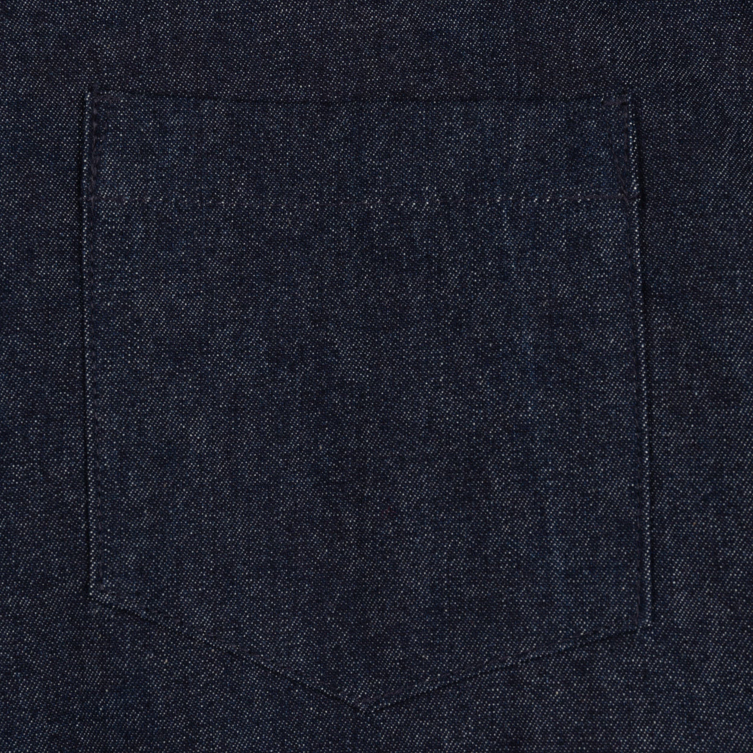 Close up of the pocket detail of the Carrier Company Denim Collar Shirt