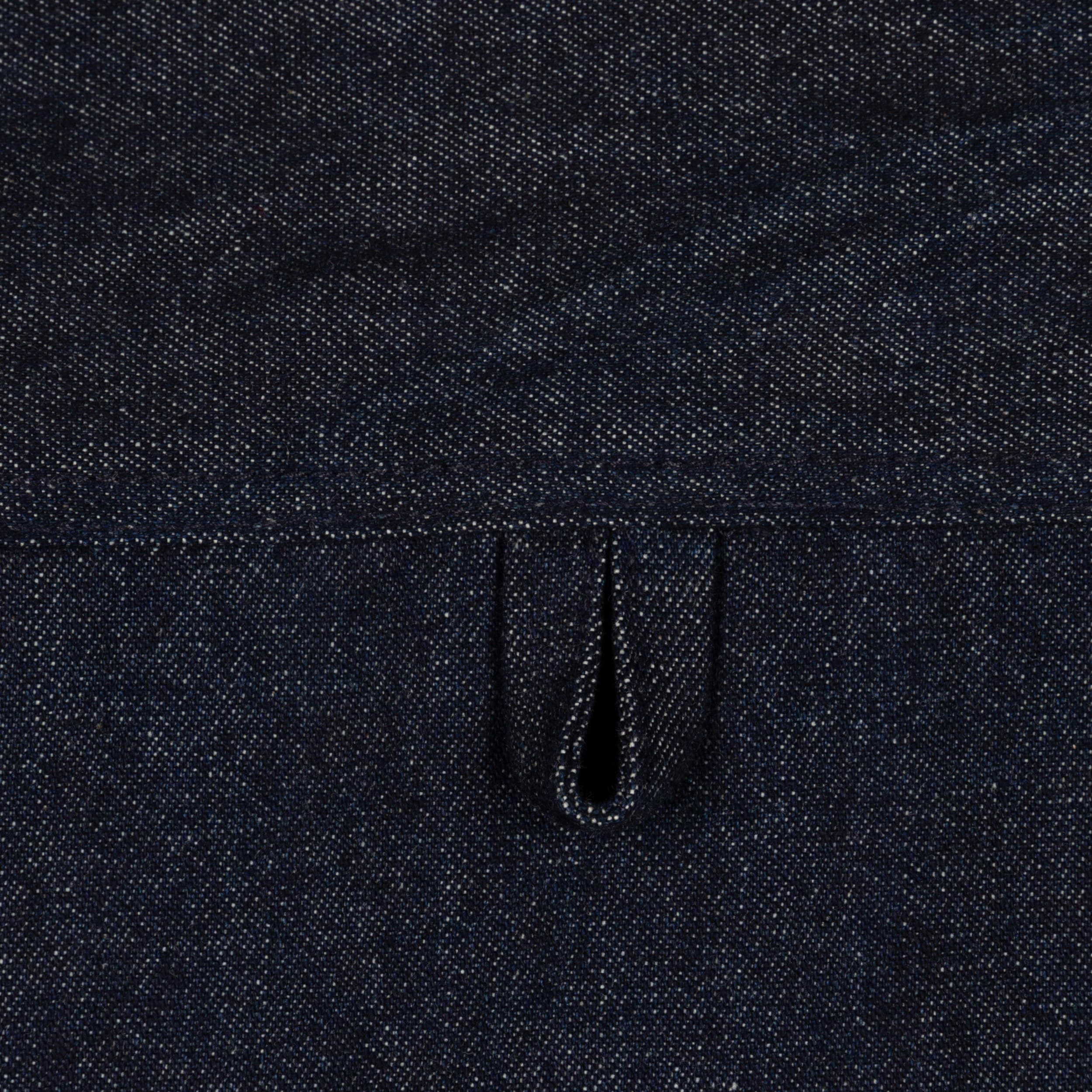 Close up of the Carrier Company Denim Collar Shirt hanging loop at the back
