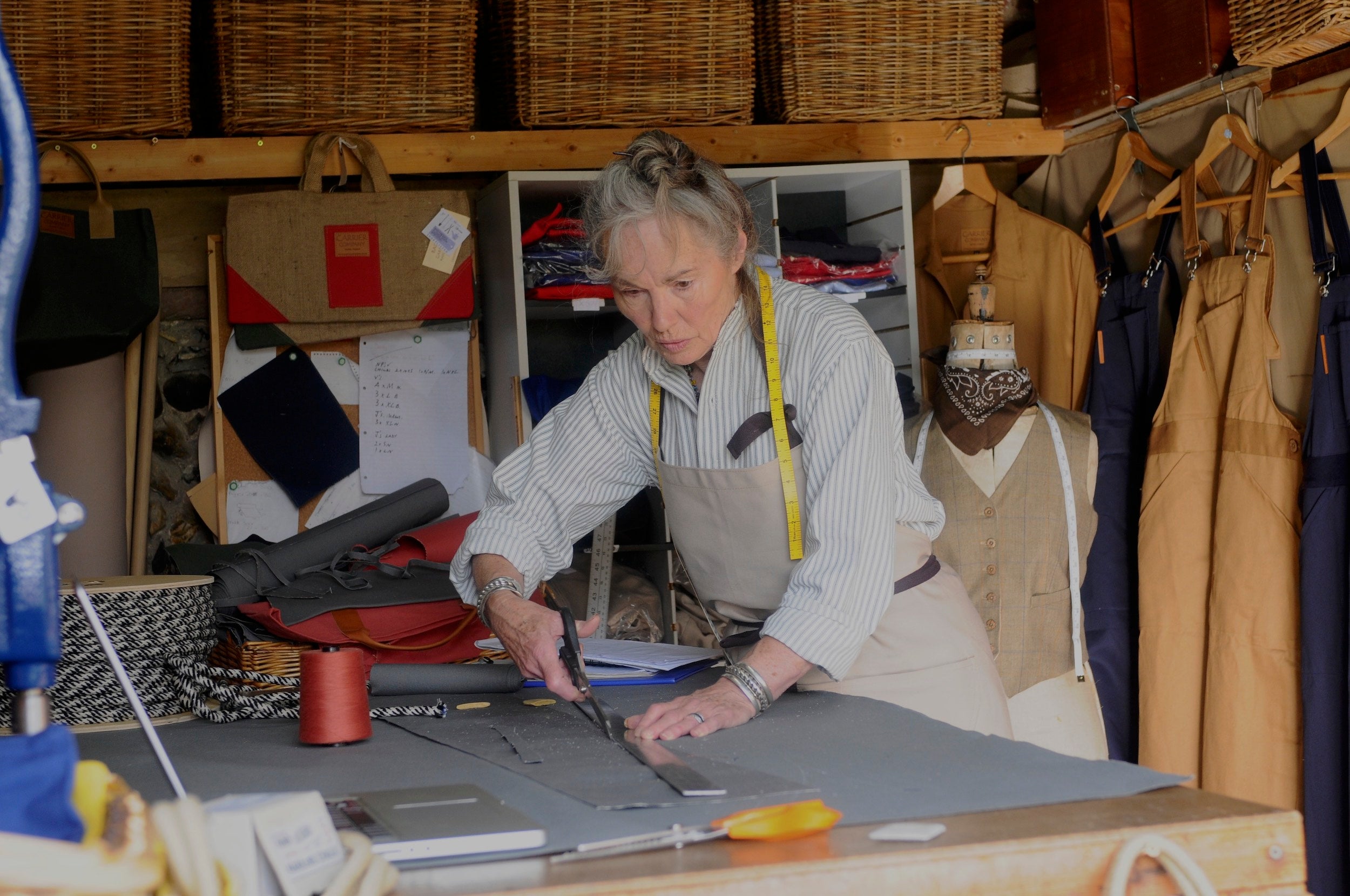 Tina wears Carrier Company Collarless Workshirt in Indigo Ticking