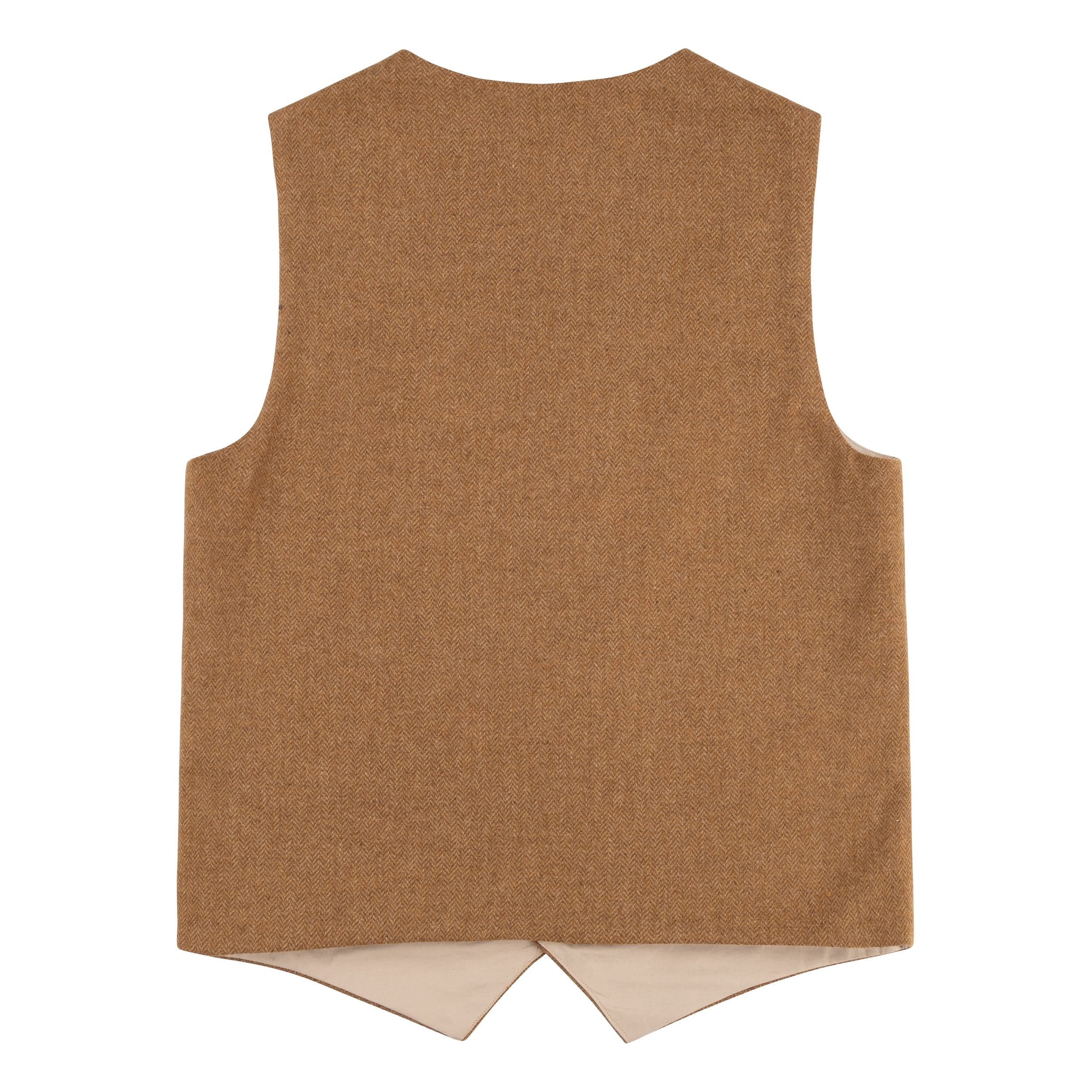 The back of the Carrier Company Men's Wool Waistcoat in Ginger Herringbone