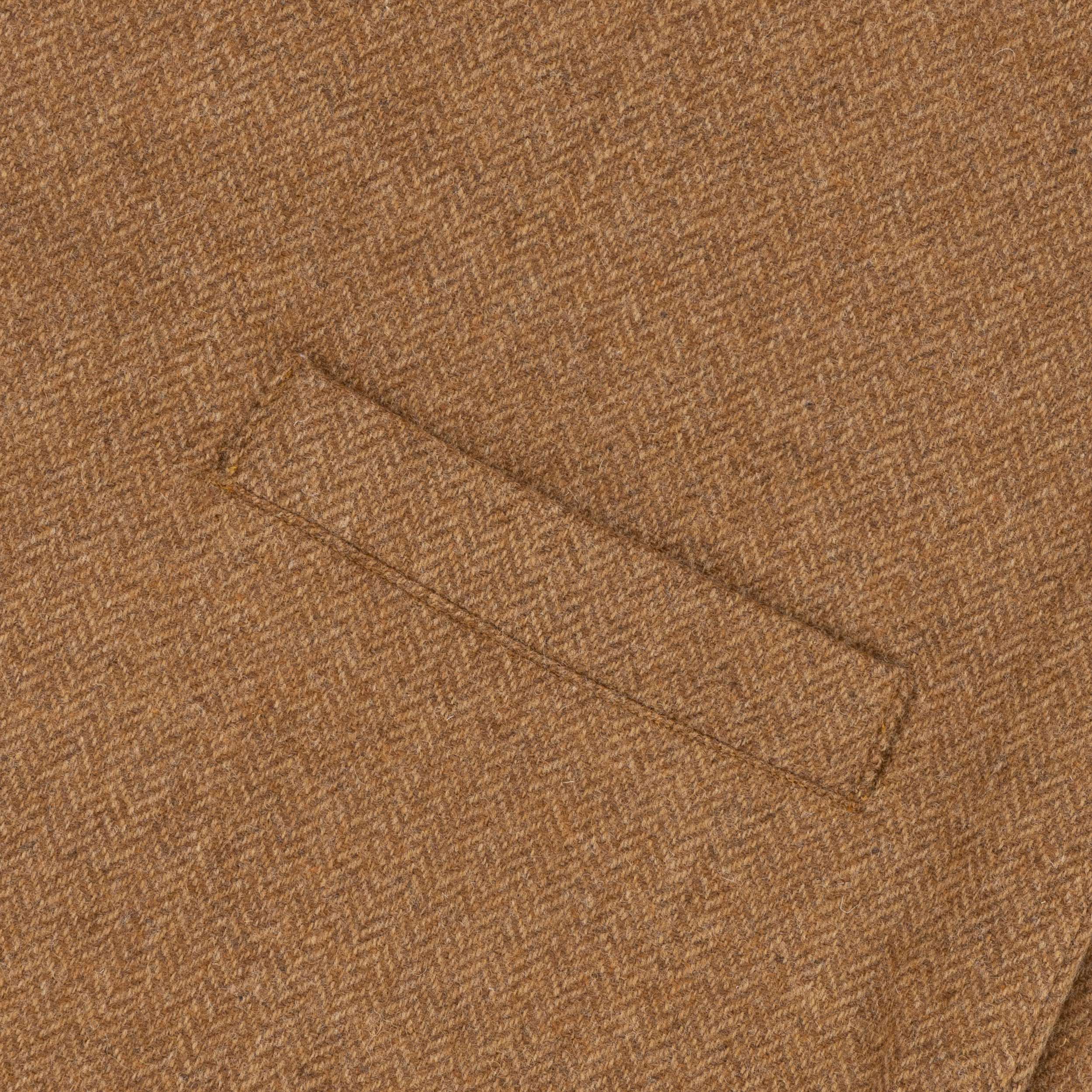 Close up of the pocket detail on the Carrier Company Men's Wool Waistcoat in Ginger Herringbone