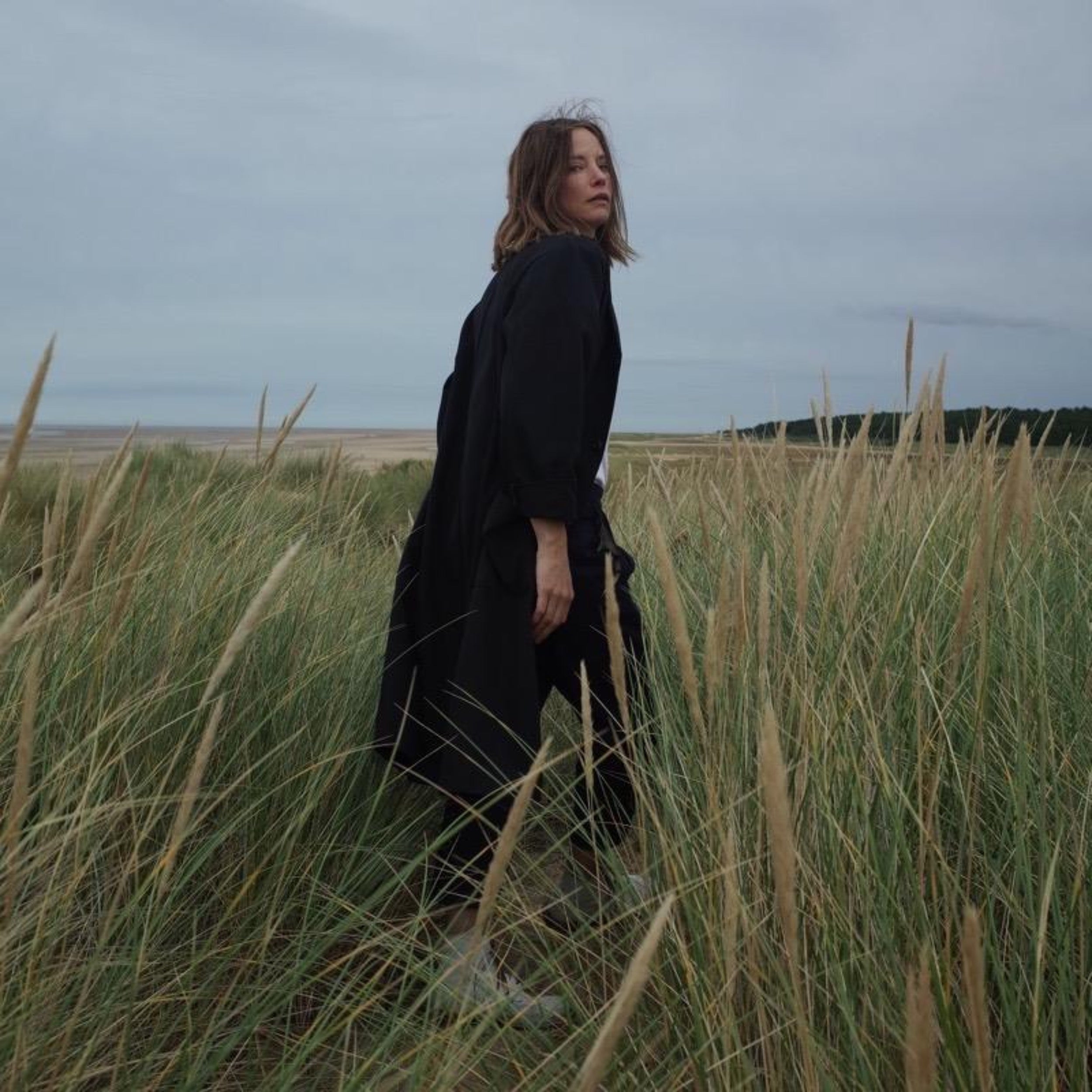 Sienna wears Stockman's Coat in Black Drill